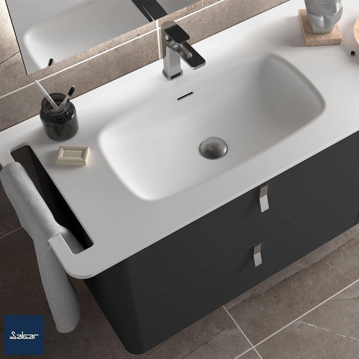 Modernes Badezimmer-Waschtisch mit rechteckigem weißem Waschbecken, schwarzem Wasserhahn, dunklen Schubladenschränken und integrierter Handtuchstange.