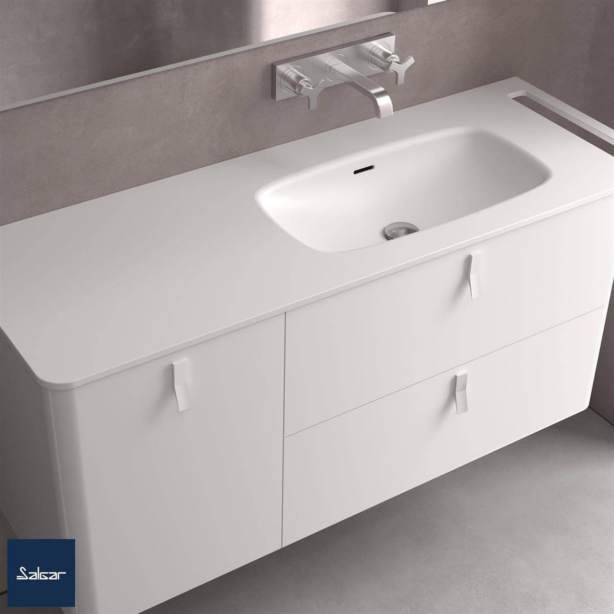 Moderner weißer Badezimmerschrank mit integriertem Waschbecken und wandmontiertem Wasserhahn an einer grauen Wand.