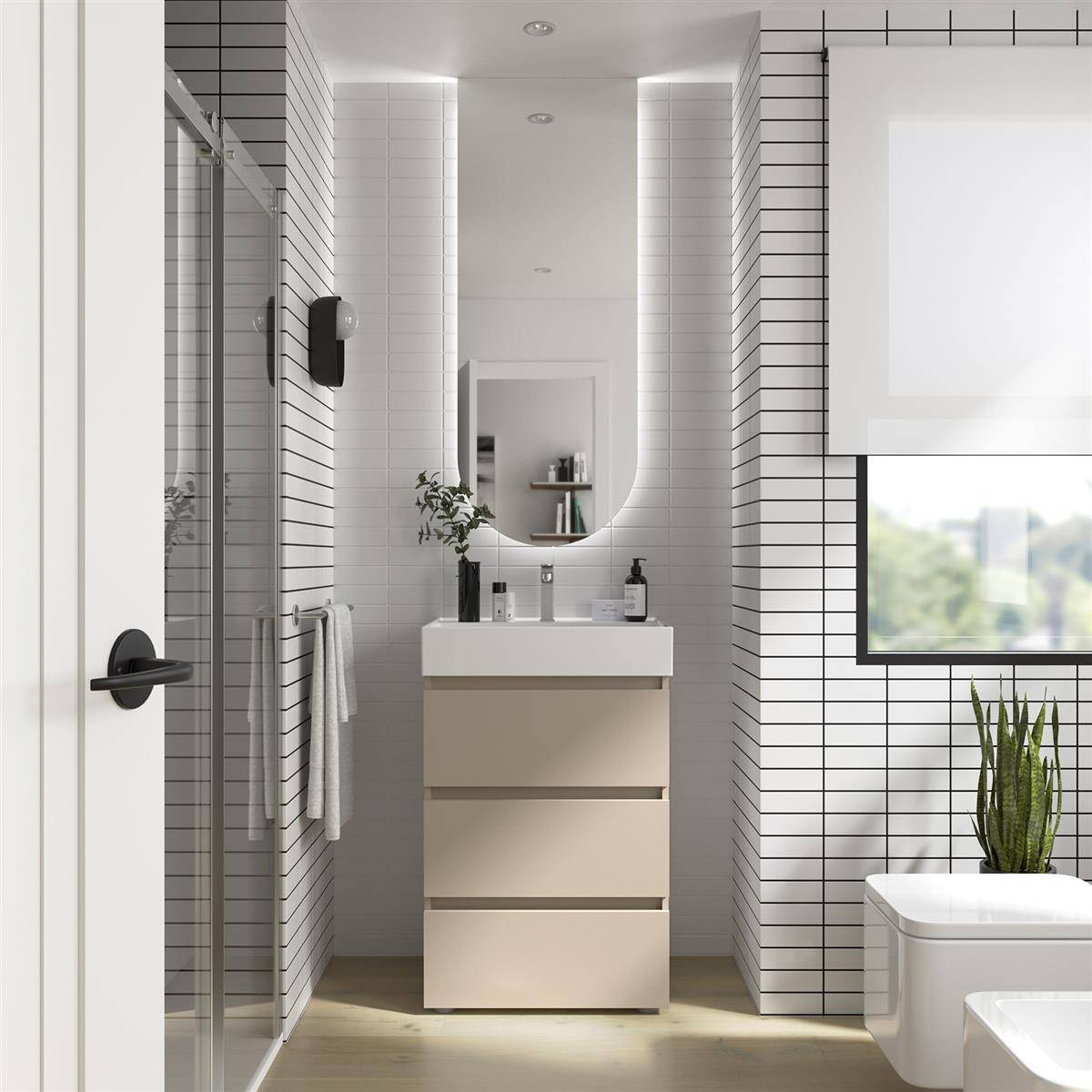 Modernes Badezimmer mit beigem Waschtisch und ovalem Spiegel zwischen gekachelten Wänden, plus Glasdusche, Fenster und Toilette.