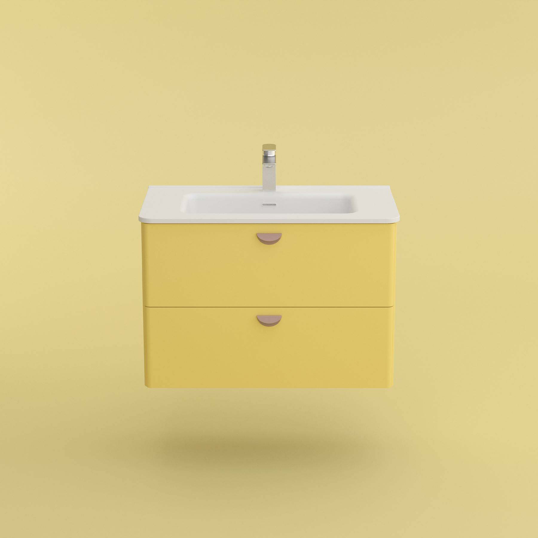 Eine moderne gelbe Waschtischplatte mit zwei Schubladen und einem weißen Waschbecken vor einem passenden gelben Hintergrund.