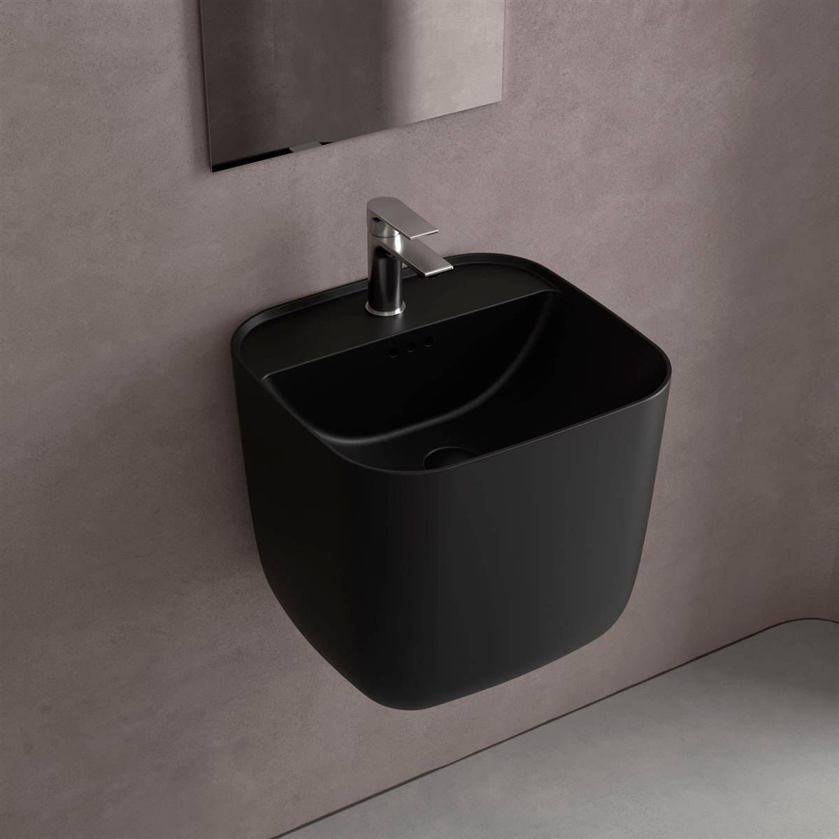 Wandmontiertes schwarzes rechteckiges Waschbecken mit Chromarmatur an einer grauen Wand, dargestellt in einer minimalistischen Badezimmerumgebung.