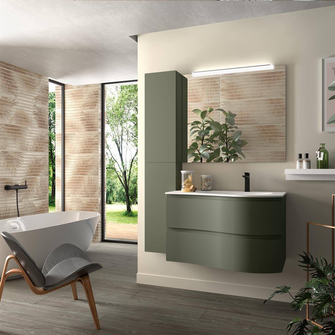 Modernes Badezimmer mit freistehender Badewanne neben großen Fenstern und olivgrünem Waschtisch mit Spiegel, Regal und Pflanzen.