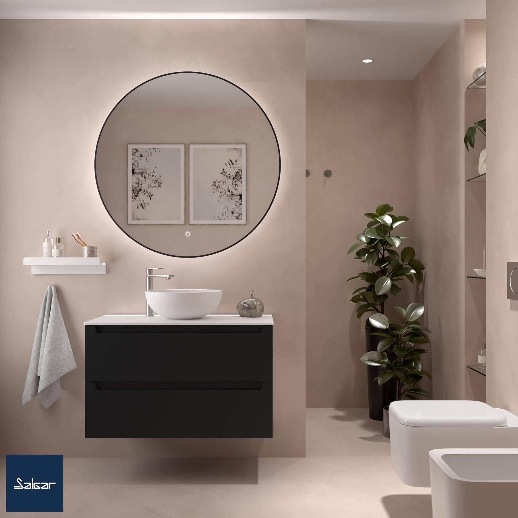 Modernes Badezimmer mit beigen Wänden, einem runden Spiegel, einem schwarzen Waschtisch mit Unterschrank, einem weißen Waschbecken, gerahmter Kunstwerk und einer Topfpflanze in der Nähe der Dusche.