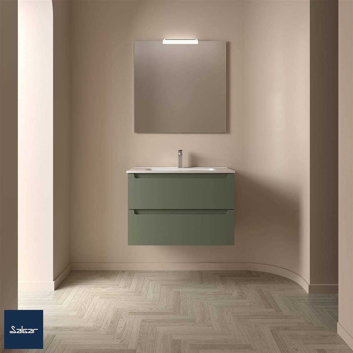 Modernes Badezimmervantity mit grünem wandmontiertem Spülschrank, quadratischem Spiegel und Oberflächenleuchte über dem Spiegel auf einer beigen Wand.