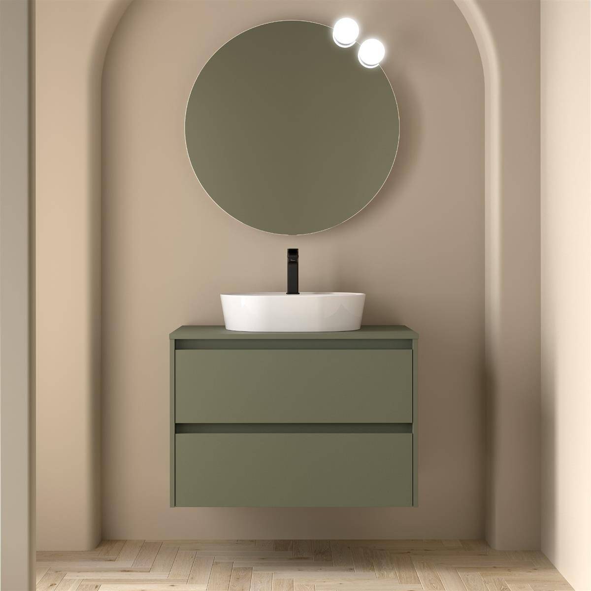 Modernes minimalistisches Badezimmer mit schwebendem Waschtisch in Salbeigrün, weißem Aufsatzwaschbecken, rundem Spiegel und gewölbter Nische.