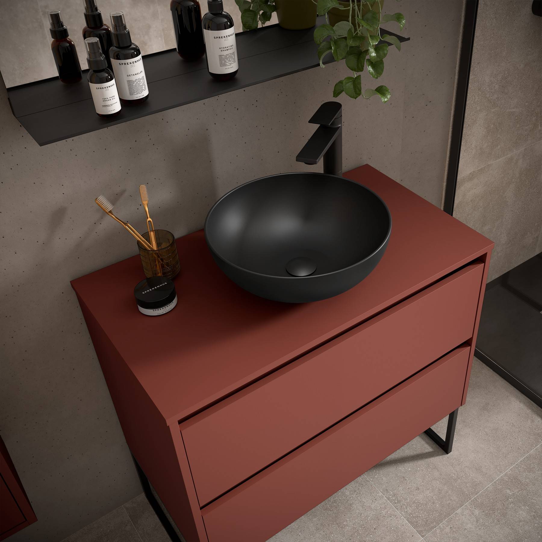 Eine moderne Badezimmerschrank-Kombination mit einem roten Schrank, einem schwarzen kreisrunden Waschbecken und verschiedenen Toilettenartikeln auf einem Regal darüber.