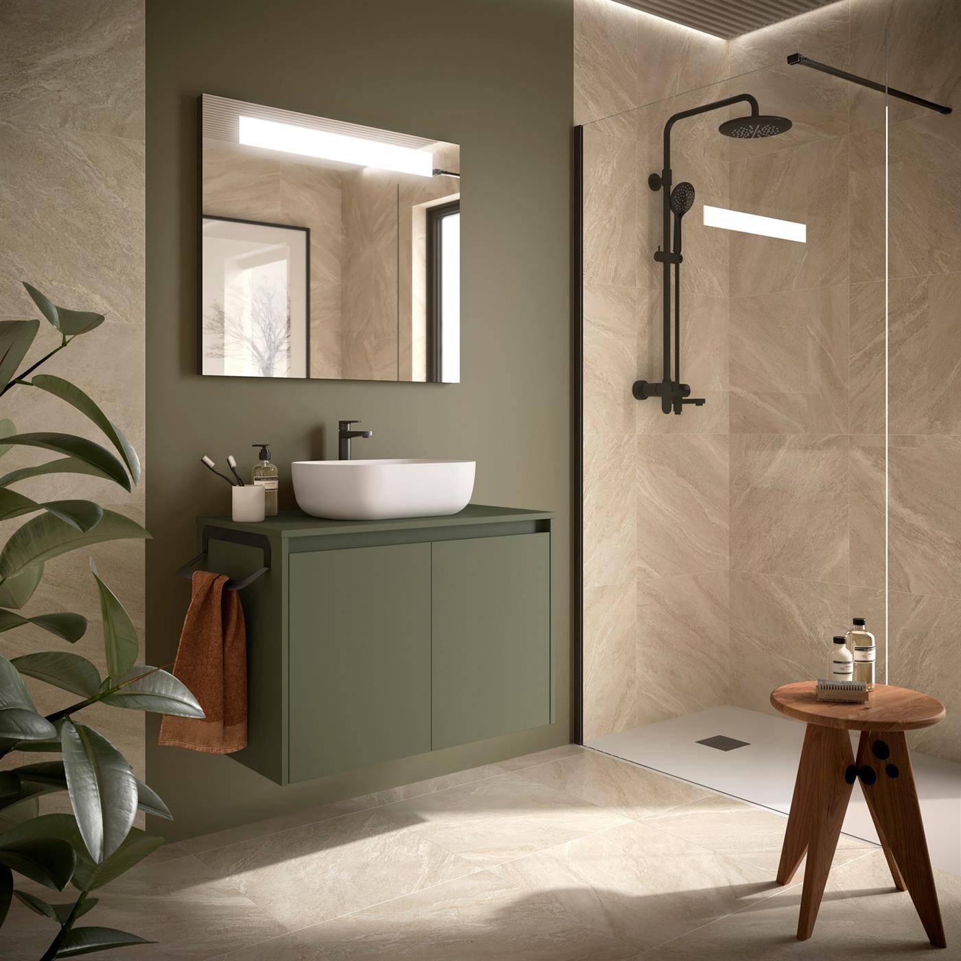 Modernes Badezimmer mit olivefarbenem Waschtisch und Aufsatzwaschbecken neben einer begehbaren Dusche mit schwarzen Armaturen und einem kleinen Holzhocker.