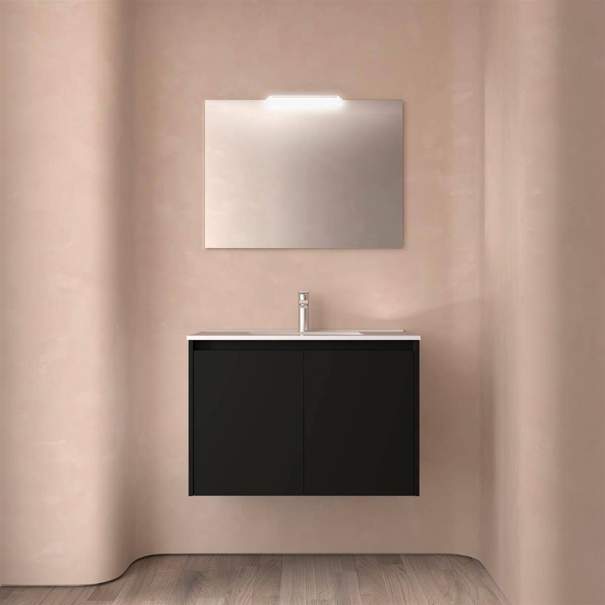 Modernes Badezimmer-Waschbecken im minimalistischen Stil mit schwarzem Schrank, Waschbecken, Armatur und rechteckigem Spiegel vor beigen Wänden.