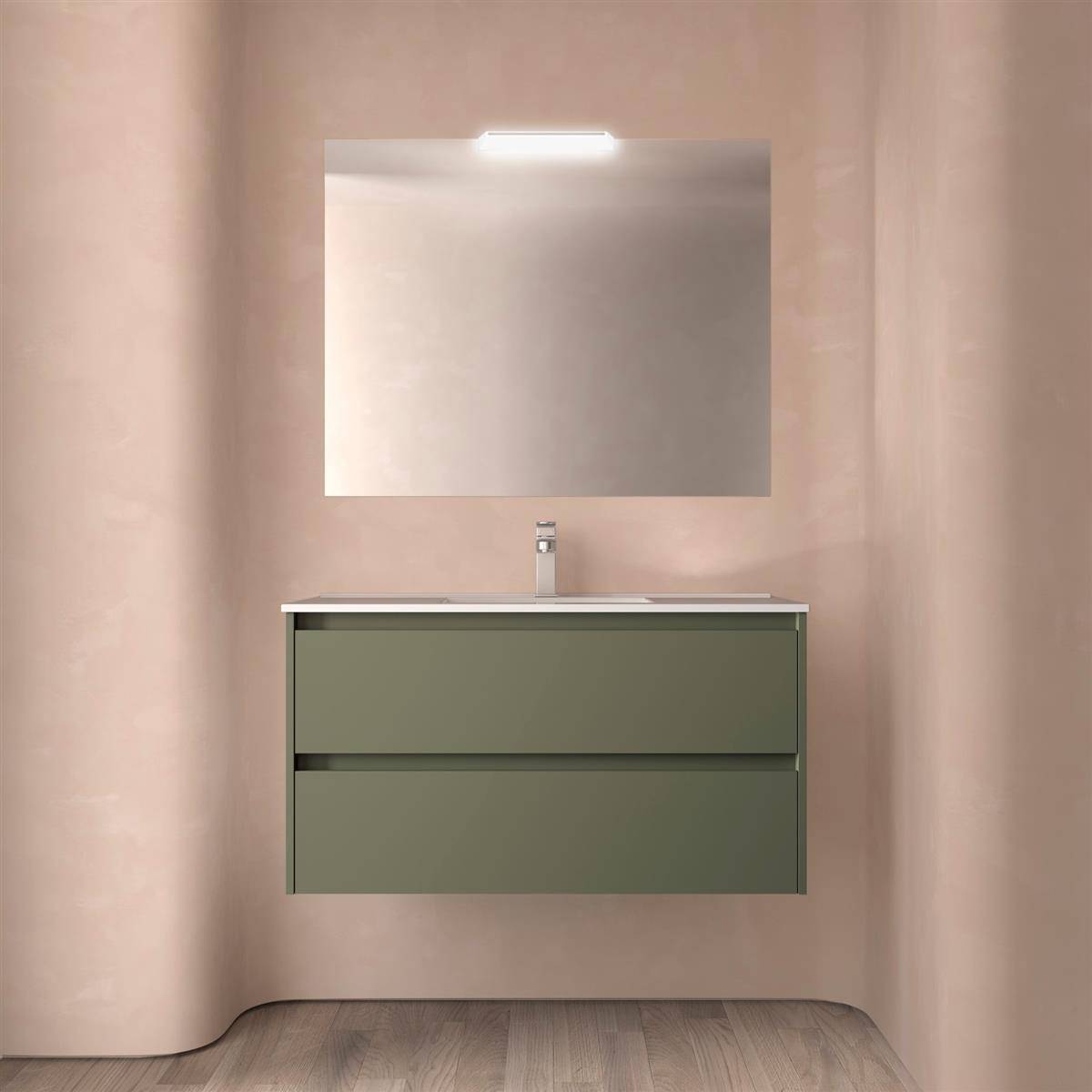 Modernes Badezimmer-Waschtisch mit olivgrünen Schubladen, Waschbecken und rechteckigem Spiegel vor beigefarbenen Wänden und Holzboden.