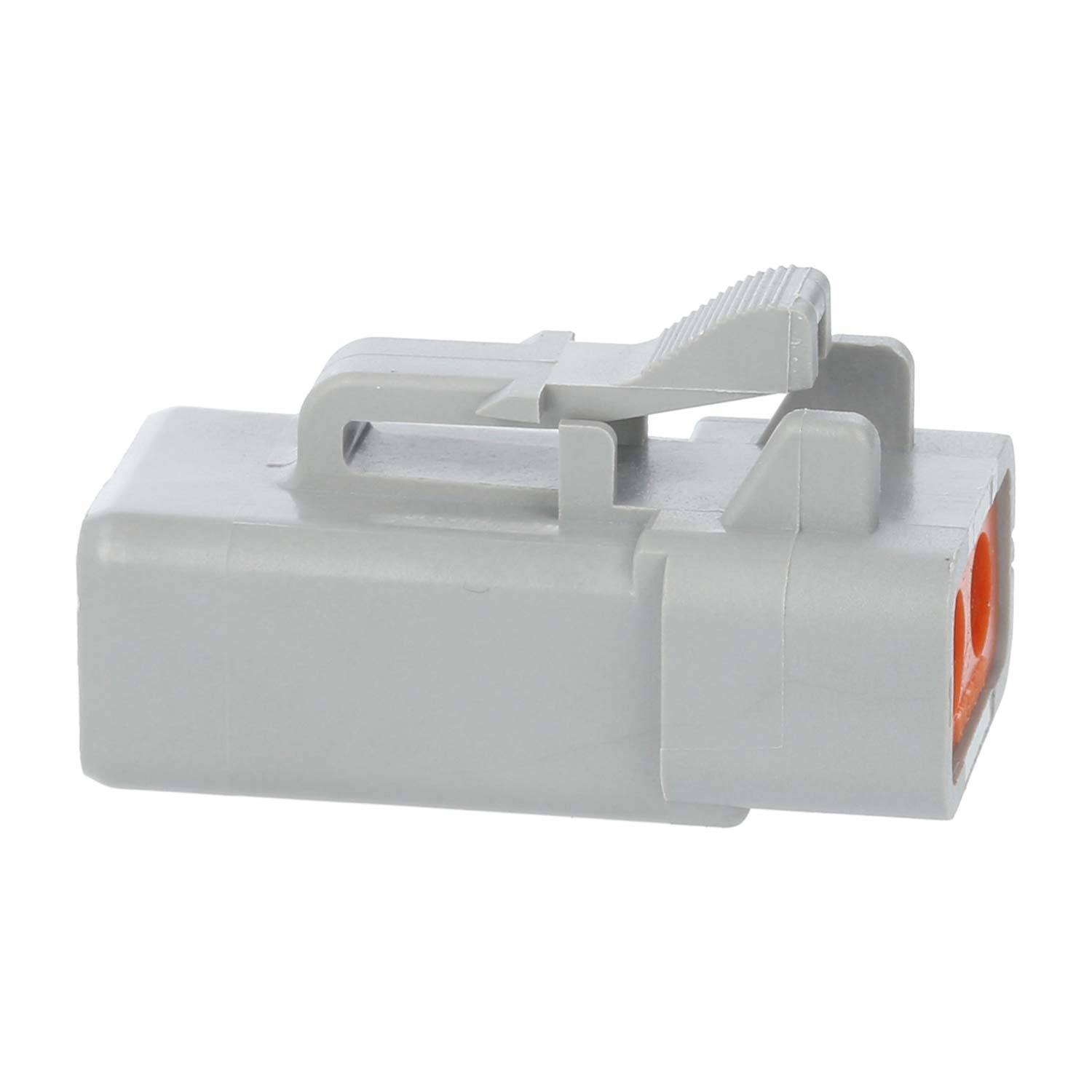 Ein rechteckiger grauer elektrischer Stecker mit zwei orangefarbenen Schlitzen, versehen mit einem Verriegelungsmechanismus an der Oberseite für eine sichere Befestigung.