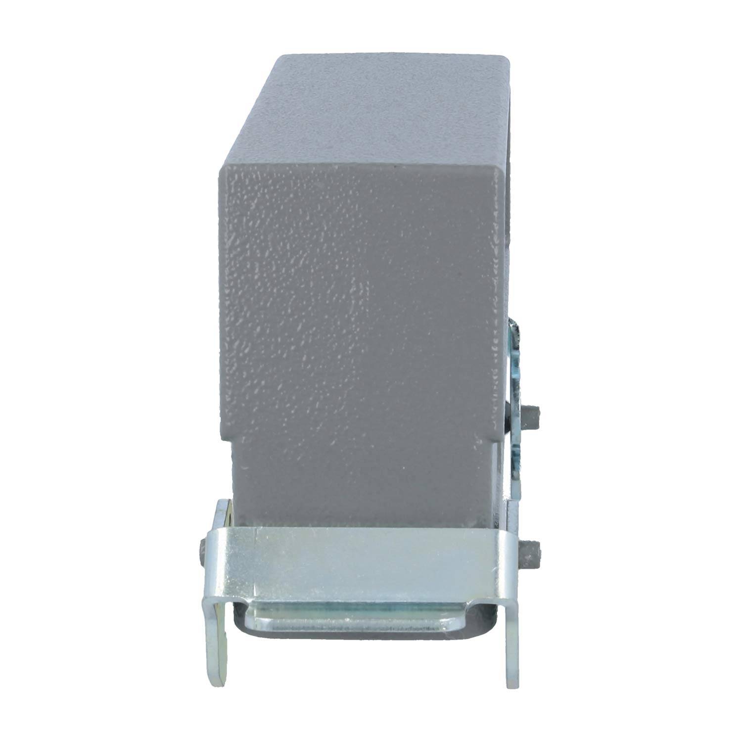 Ein grauer rechteckiger Metallapparat mit strukturierter Oberfläche, an einem Metallhalterung montiert, höchstwahrscheinlich Teil einer industriellen oder technischen Anlage.