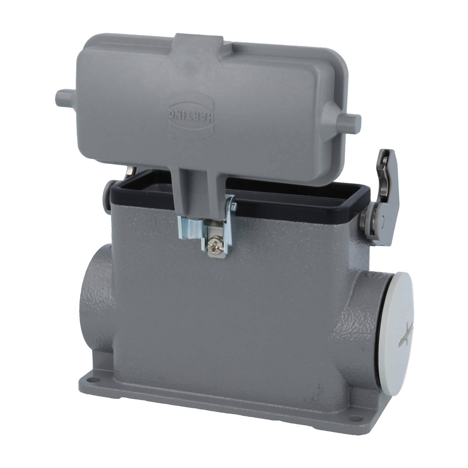 Eine graue TRP-Box mit Deckel und Scharnier sowie seitlichen Anschlüssen, die zum Schutz von elektrischen Leitungen oder Komponenten verwendet wird.