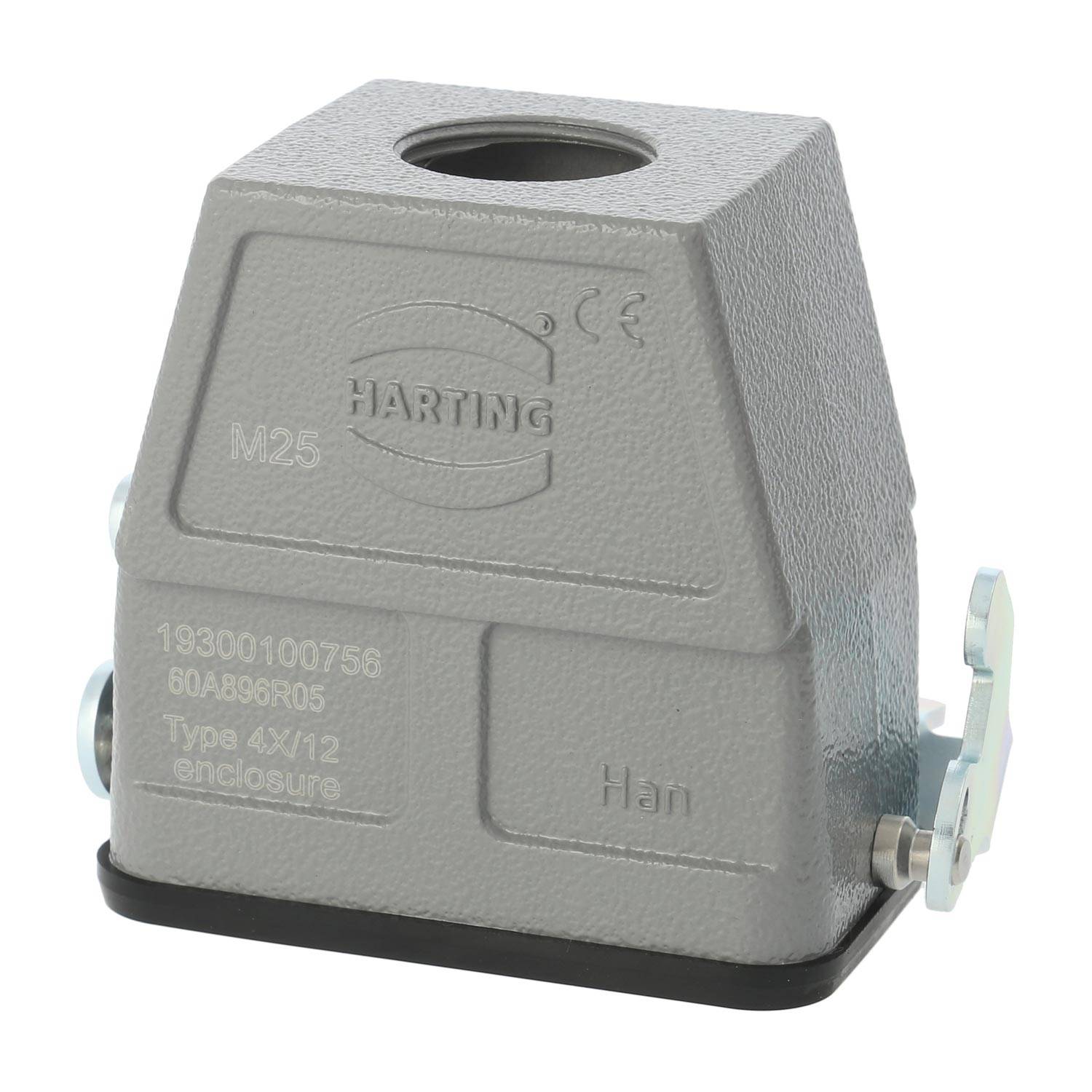 Ein silbernes, trapezförmiges Harting-Elektroverbindergehäuse mit einem zentralen Gewindeloch an der Oberseite und seitlichen Verriegelungen, beschriftet mit Spezifikationen.