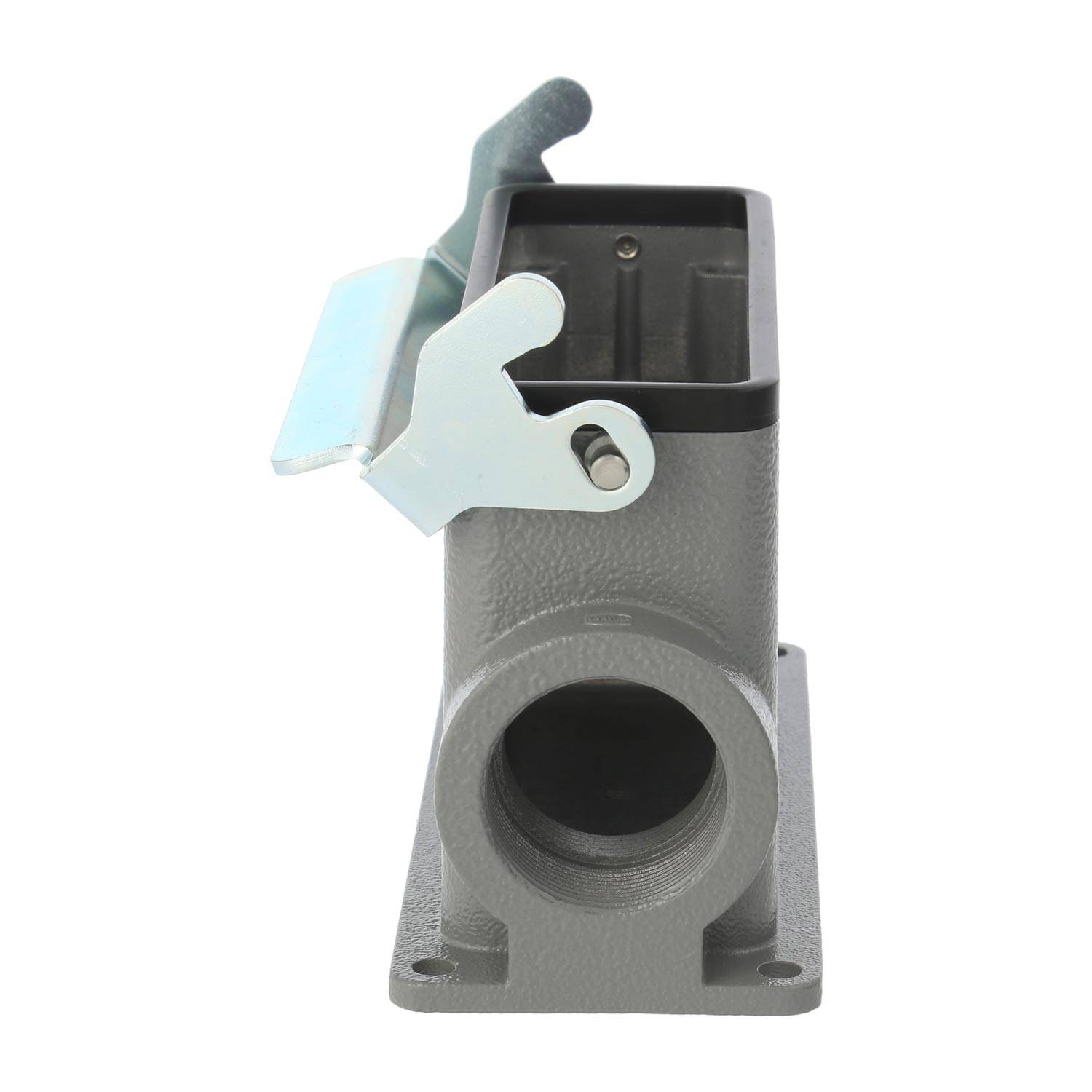 Ein grau-rechteckiges Metallgehäuseteil mit einem klappbaren Deckel und einer kreisrunden Öffnung am Boden, konzipiert für industrielle oder mechanische Anwendungen.