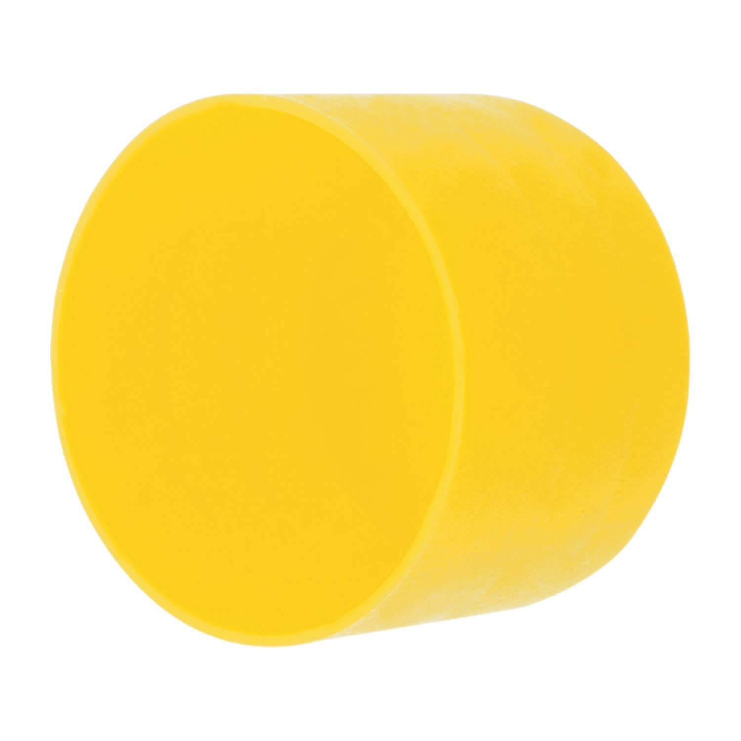 Eine hellgelbe, zylindrische Kappe.