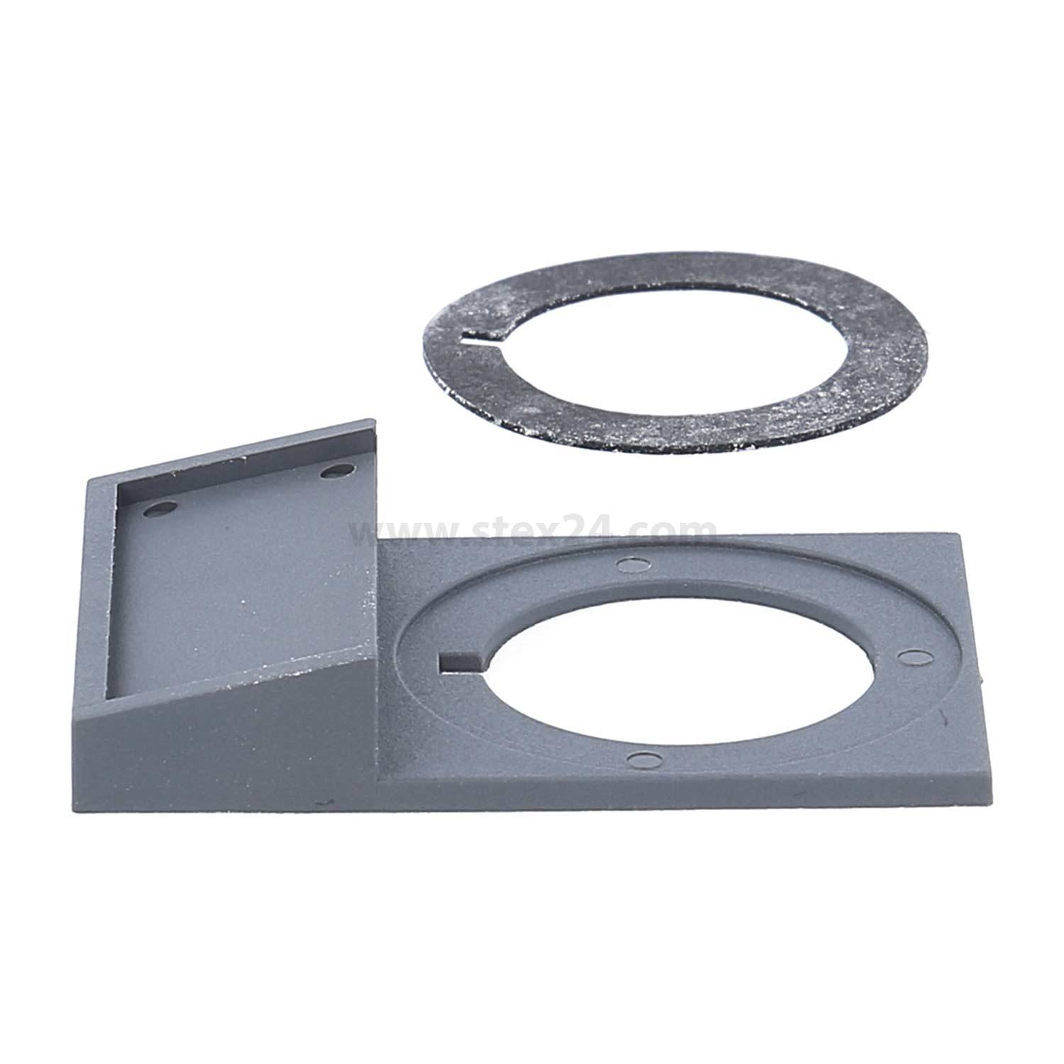 Eine kreisförmige Dichtung und eine rechteckige Montageklammer mit einer kreisrunden Aussparung sind vor einem einfarbigen weißen Hintergrund angeordnet.