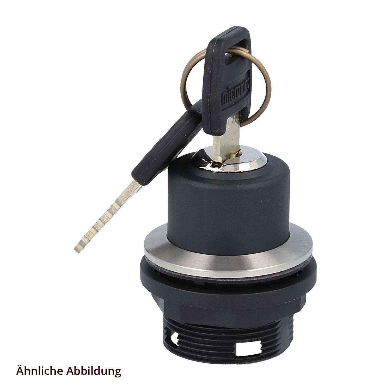 Ein schwarzer kreisförmiger Schlüsselschalter mit einem Metallschlüssel, der mit 