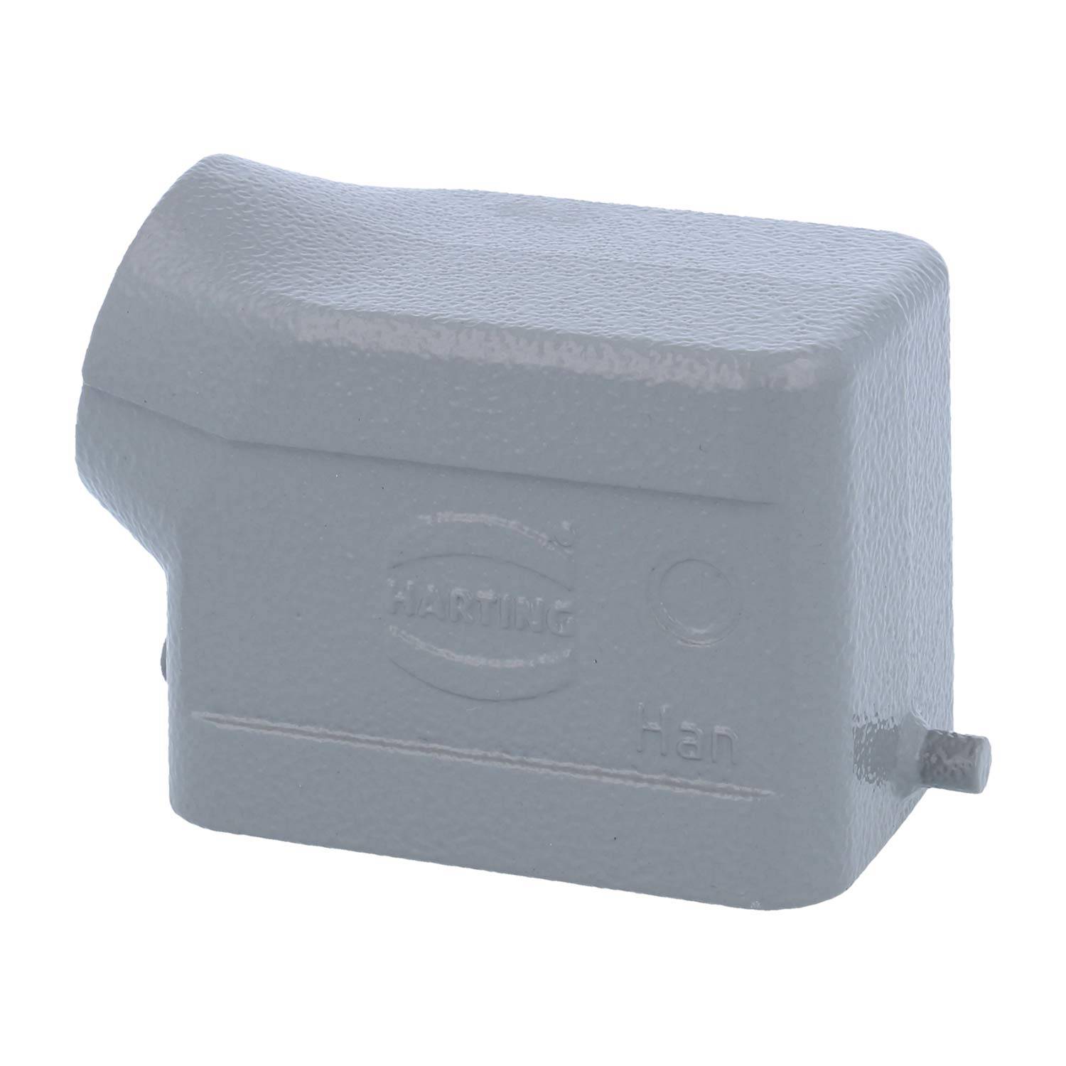 Eine graue, rechteckige Metallabdeckung mit abgerundeter Oberseite und kleiner seitlicher Ausbuchtung, versehen mit geprägter Markierung.