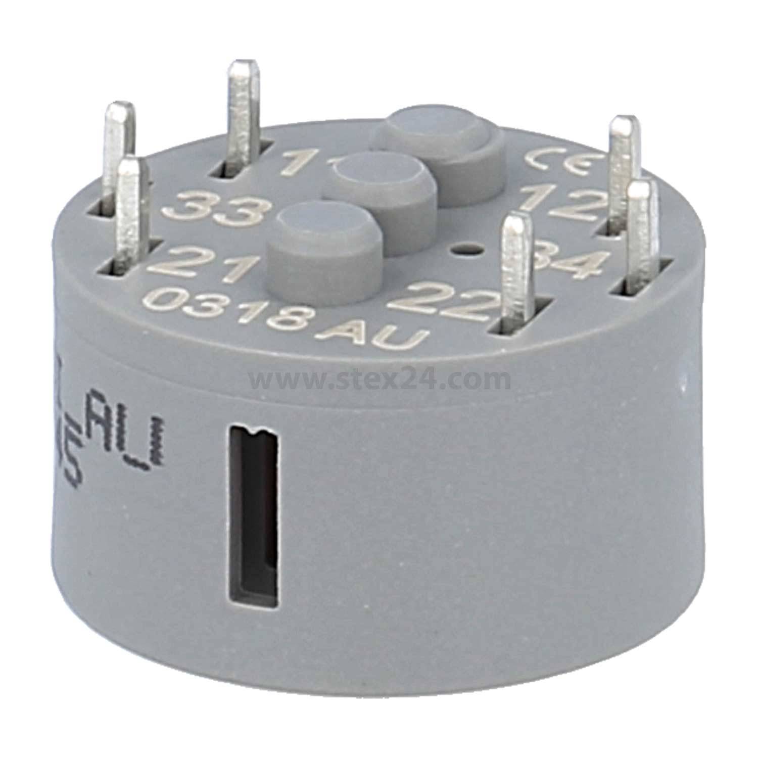 Eine zylindrische elektronische Komponente mit mehreren Metallstiften und eingraviertem Text, die für elektrische Verbindungen in Schaltkreisen verwendet wird.