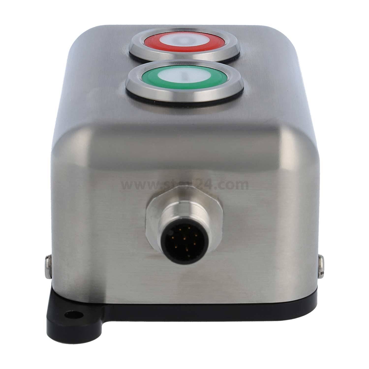 Ein silbernes Metallgerät mit einer roten und einer grünen Taste oben, versehen mit einem Anschlussport an einer Seite, höchstwahrscheinlich eine industrielle Steuerungseinheit.