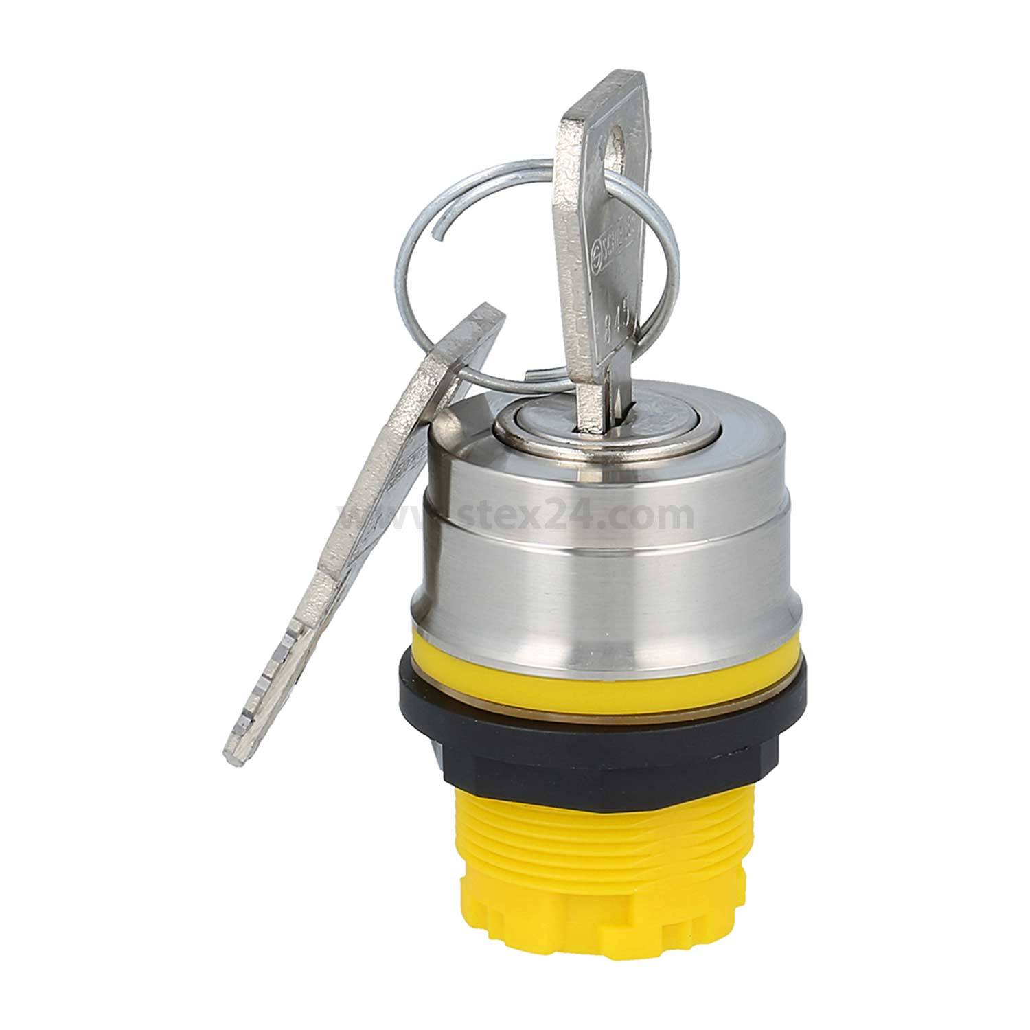 Ein gelb-silberner Verschlussmechanismus mit zwei eingelegten Schlüsseln, befestigt an einer kreisförmigen Metallbasis.