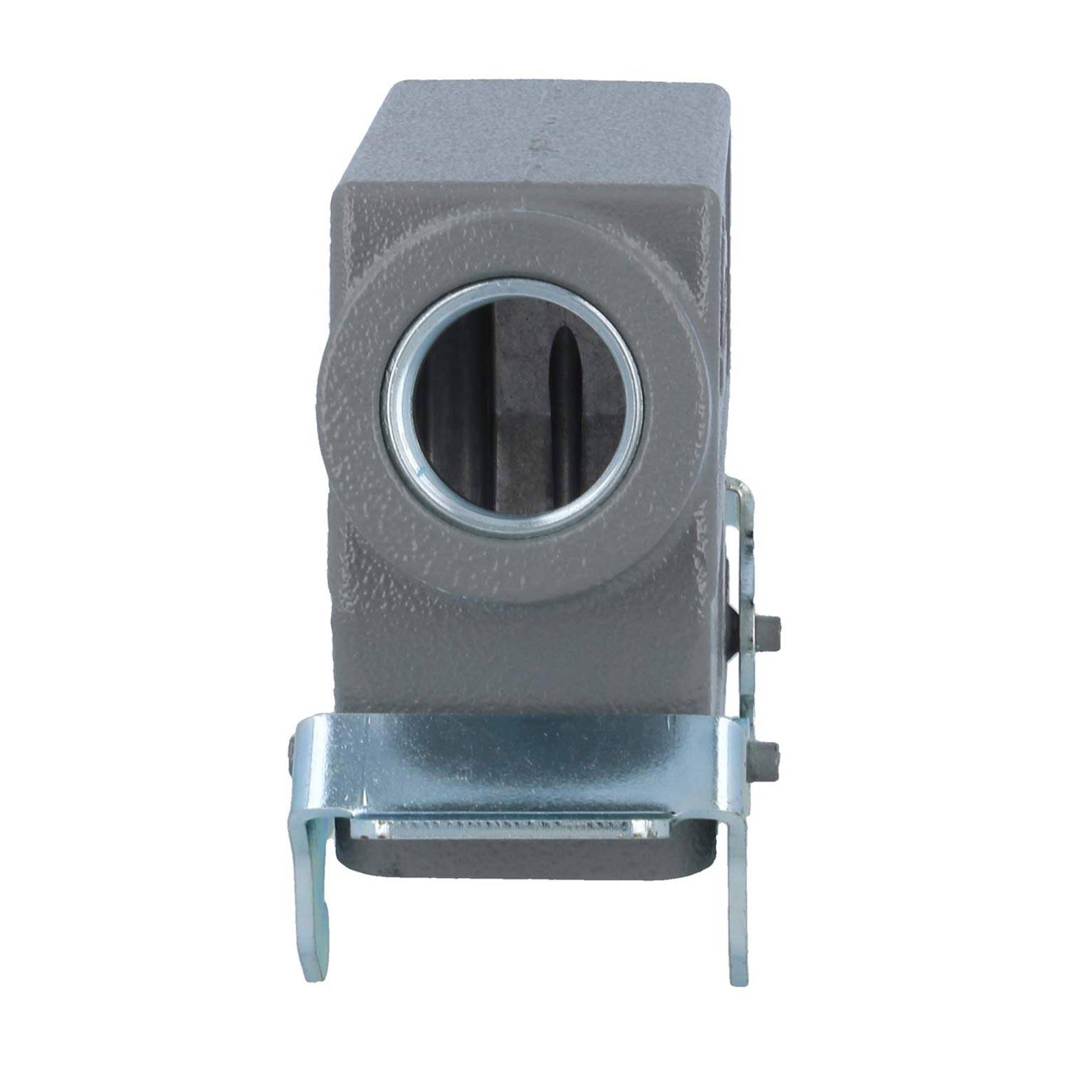 Ein grauer Metallblock mit einem kreisförmigen Loch in der Mitte, auf einer Halterung montiert.