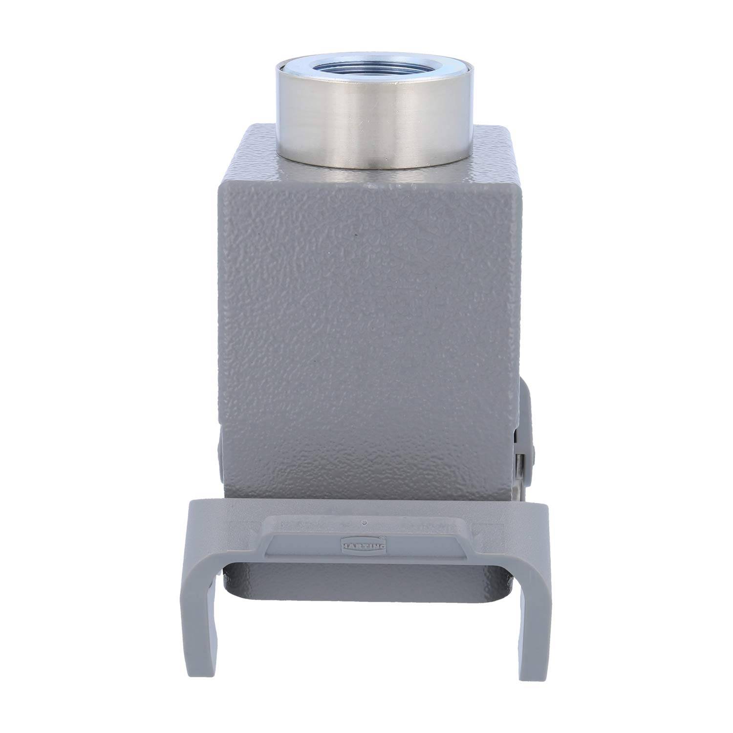 Ein grauer, rechteckiger Metallblock mit einer kreisförmigen Öffnung an der Oberseite, der über einer grauen U-förmigen Klammer platziert ist. Das Design wirkt industriell.