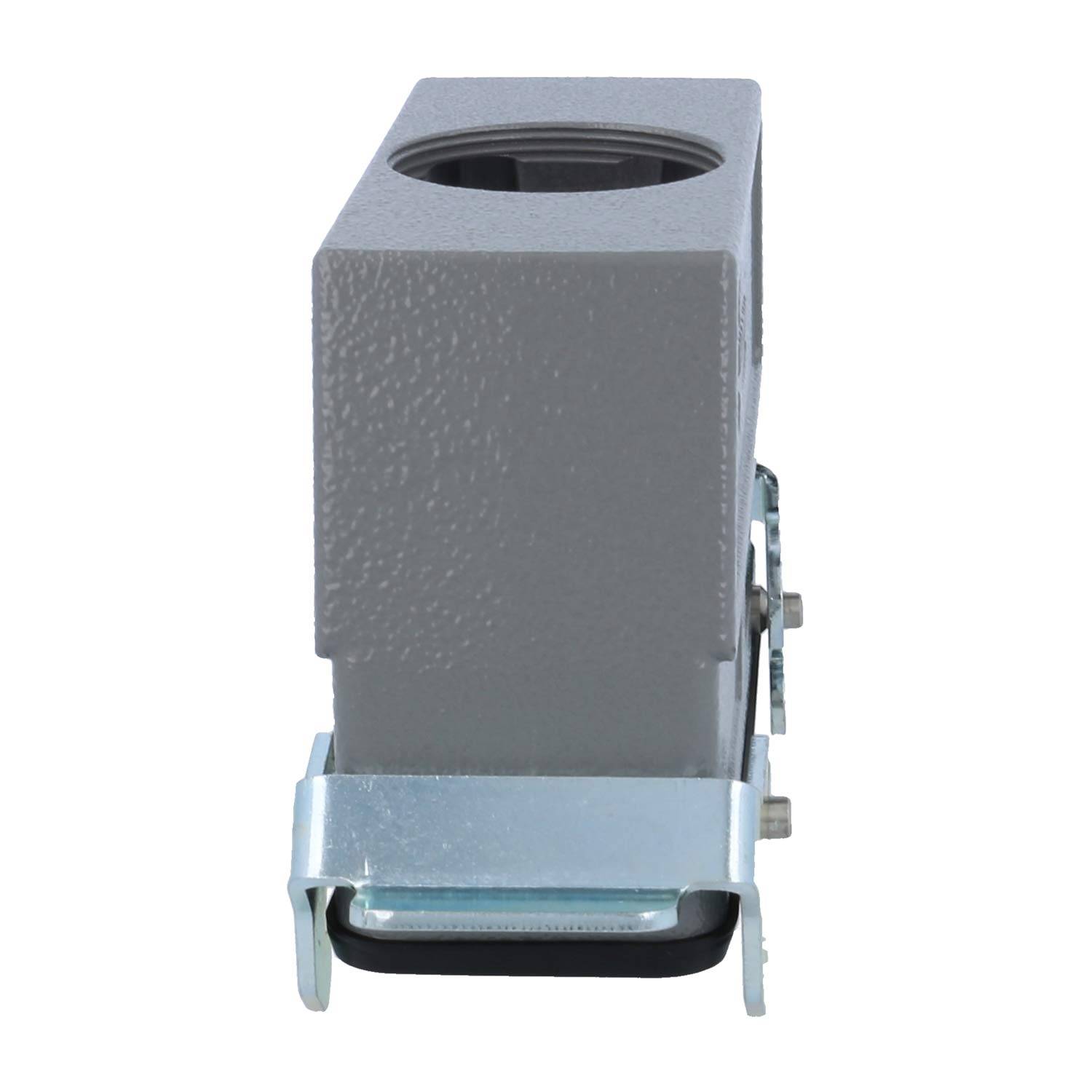 Ein rechteckiges graues Metallgehäuse mit einer zylindrischen Öffnung und einem Metallbügel an der Basis, verwendet zur Befestigung oder Montage.