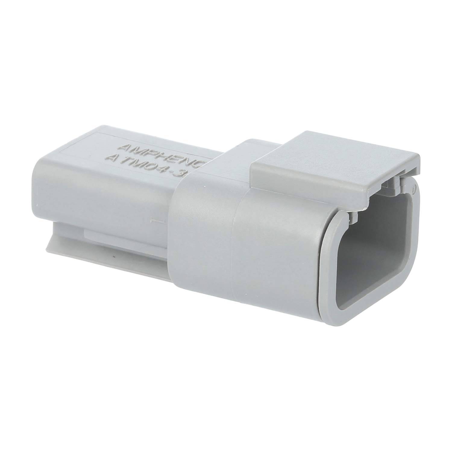 Ein grauer rechteckiger Steckverbindergehäuse mit offenem Ende und Verschlussmechanismus, der typischerweise in Elektronik- oder Automotive-Verdrahtungssystemen verwendet wird.