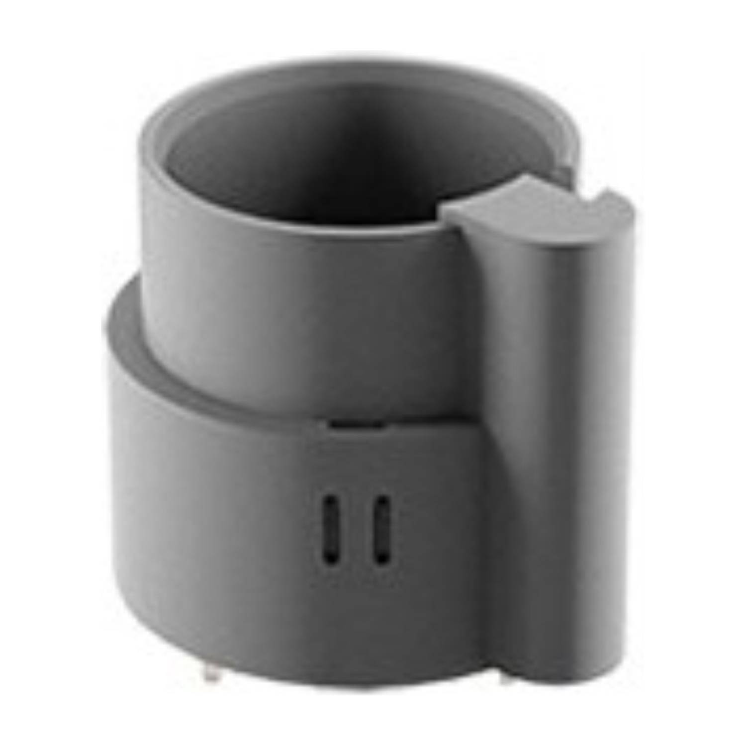 Ein grauer zylindrischer Halter oder Sockel, wahrscheinlich zum Sichern oder Montieren eines Gegenstands, mit einer gekrümmten Seite und zwei kleinen Schlitzen nahe der Basis.