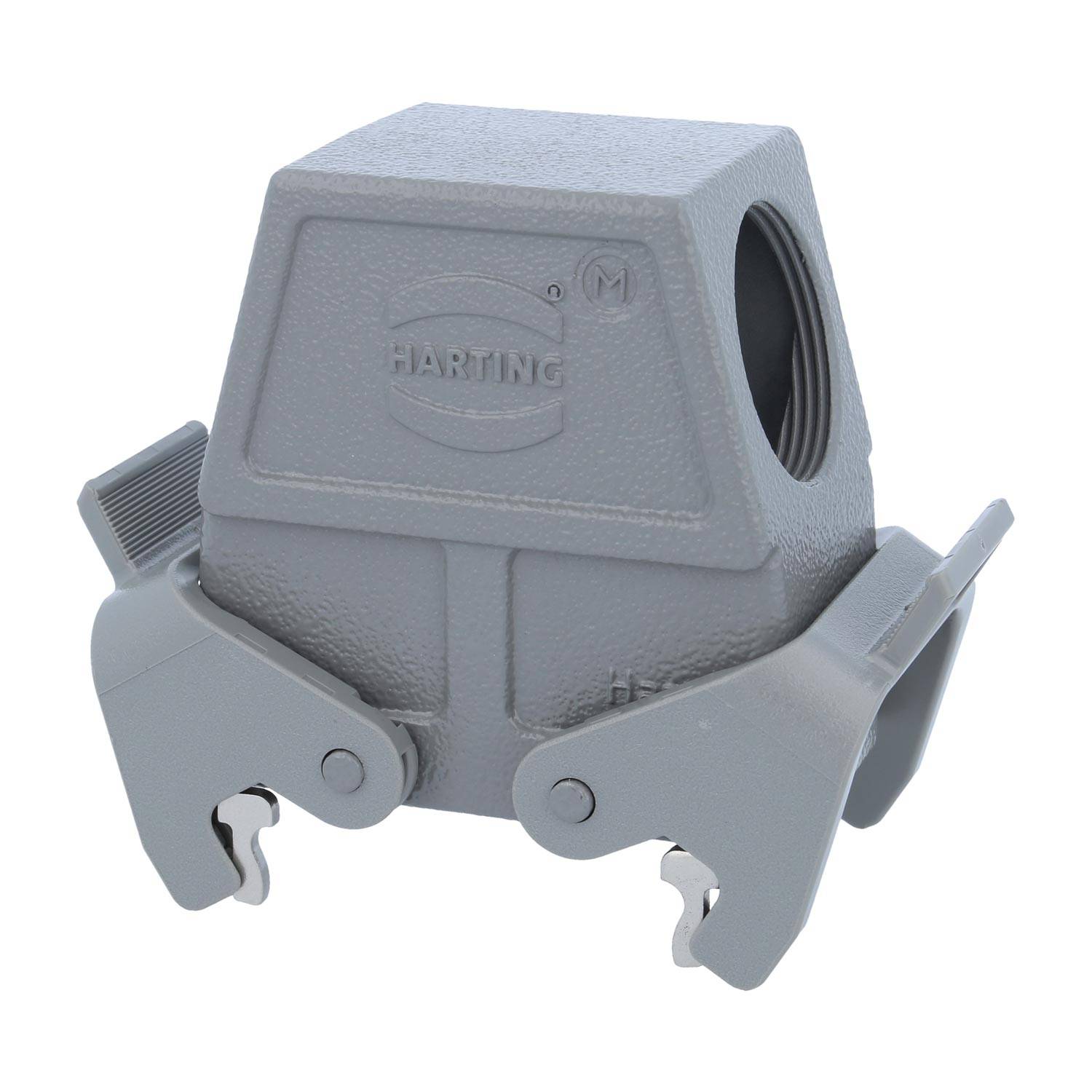 Eine graue rechteckige industrielle Anschlusshaube mit seitlichem Eingang und Verriegelungsmechanismus, mit dem Markennamen 'HARTING', der in sie eingeprägt ist.