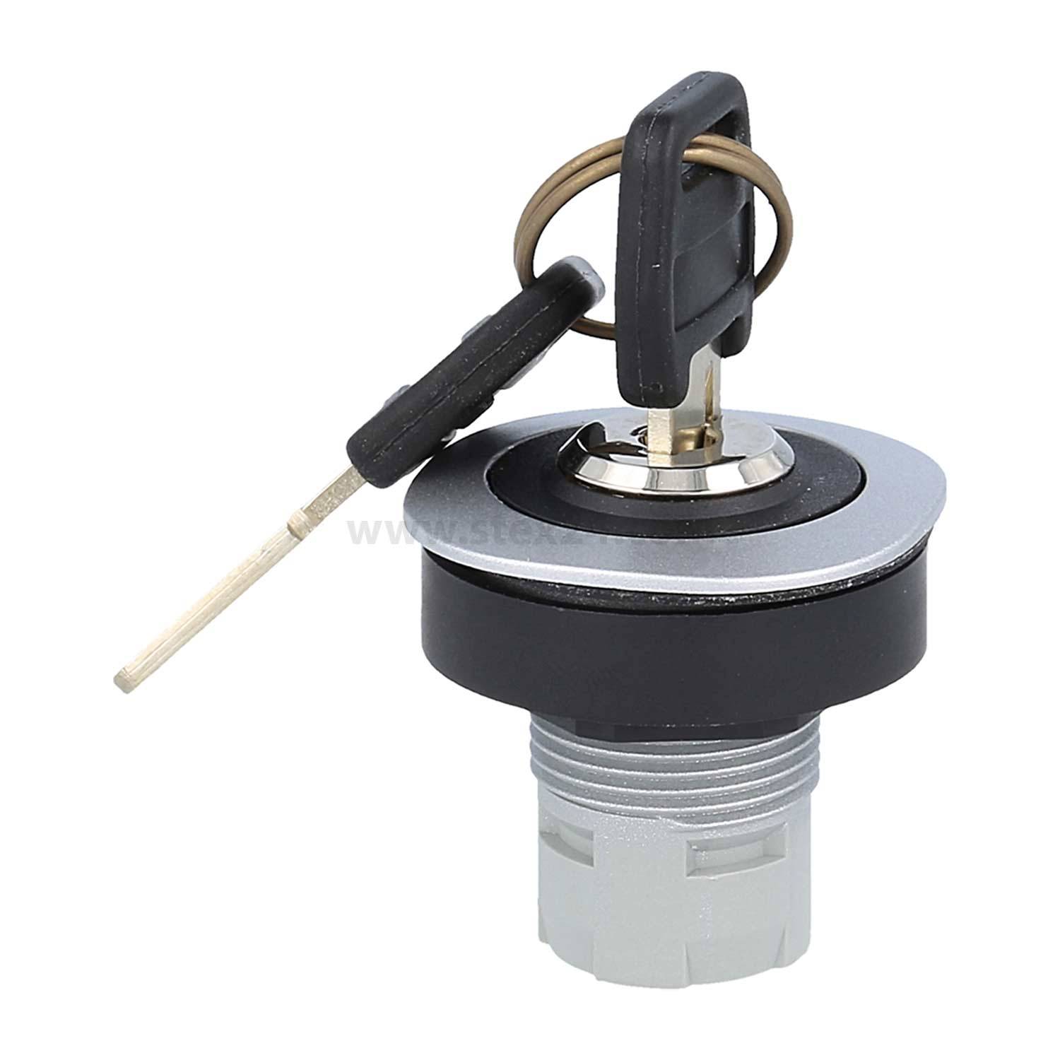 „Ein schwarzer und silberner Schließzylinder mit einem eingesteckten Schlüssel, teilweise gedreht, der einen Verschließmechanismus für ein Gerät oder eine Ausrüstung andeutet.