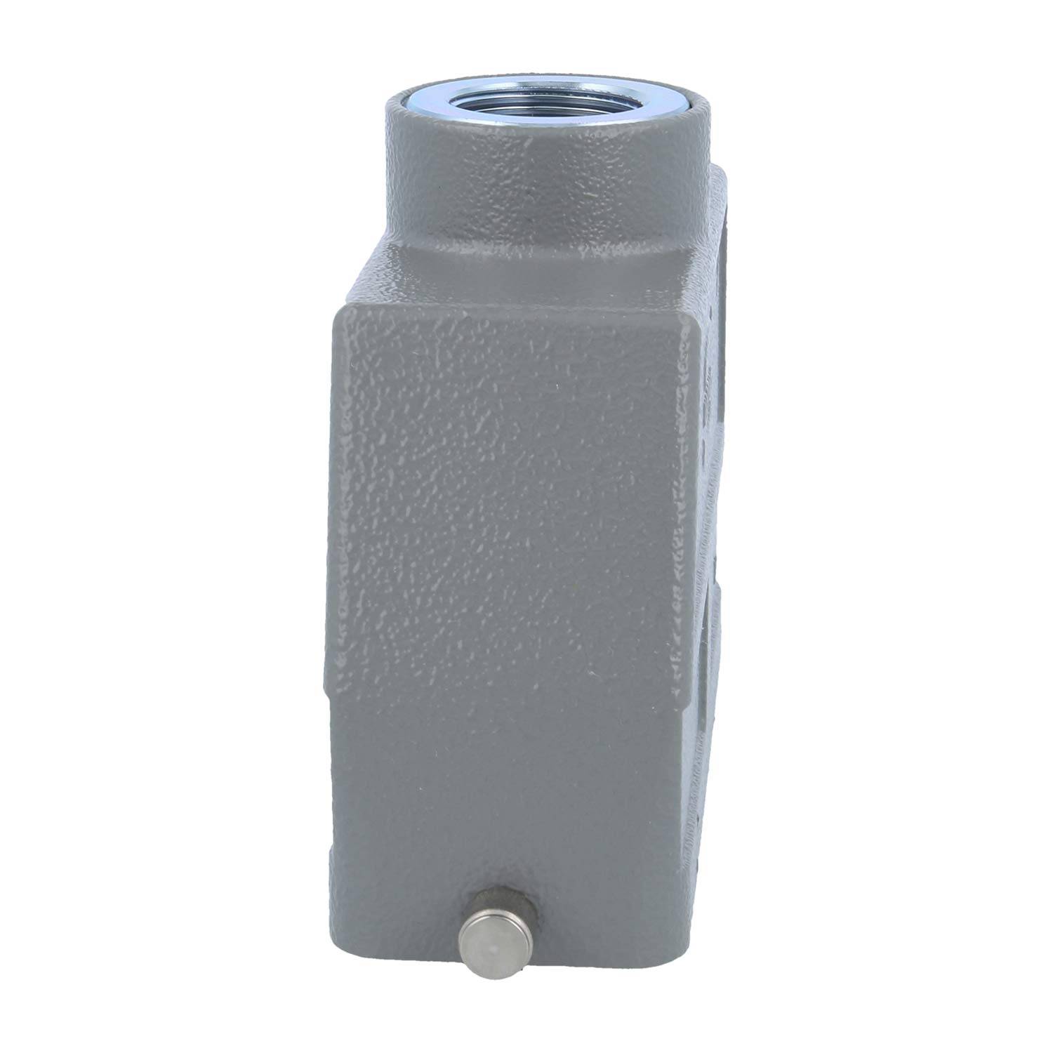 Eine graue Metallkomponente mit einer Gewindebohrung an der Oberseite und einem kleinen hervorstehenden Bolzen an der Seite, möglicherweise ein Teil einer Industriemaschine.