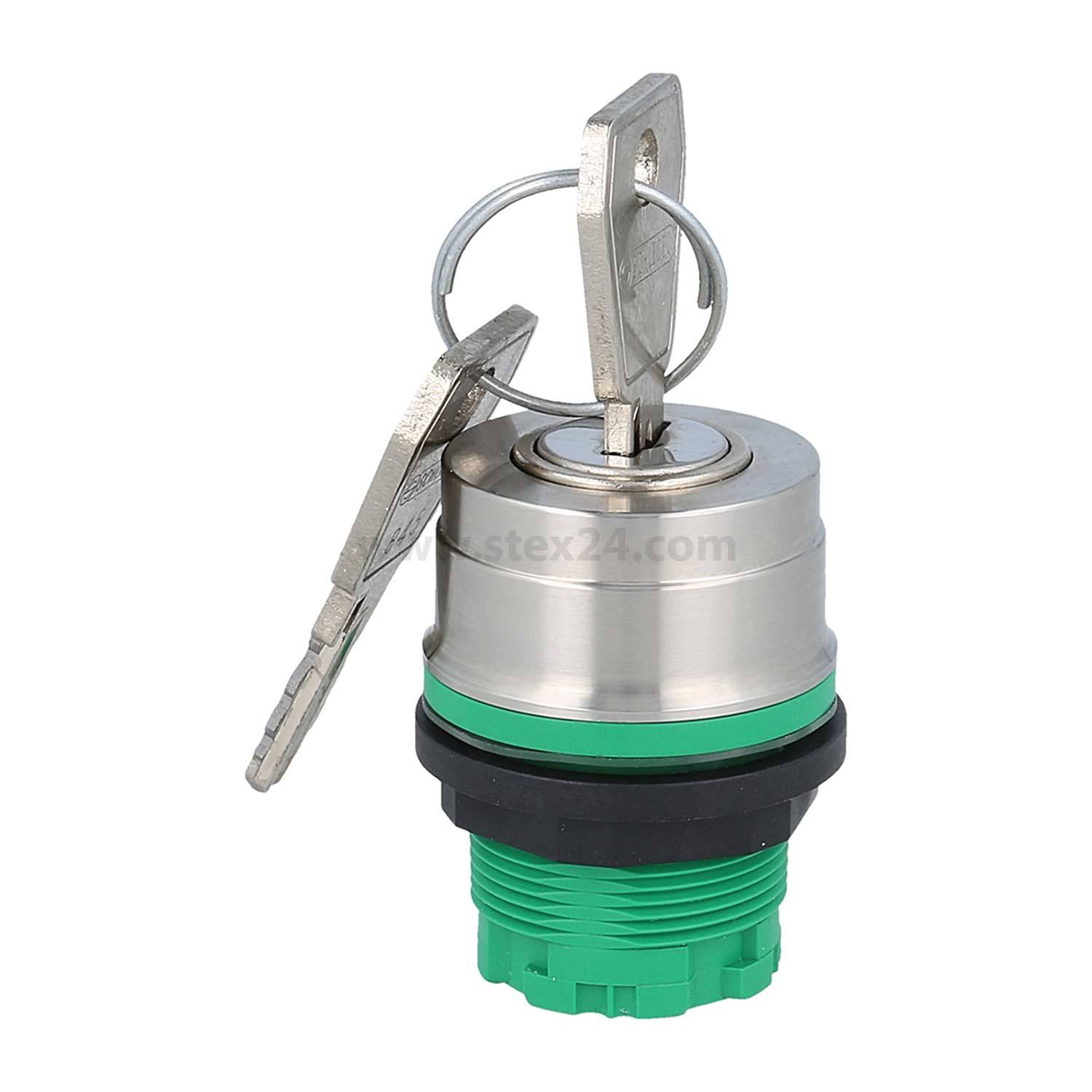 Ein Metallschlüsselschalter mit zwei eingelegten Schlüsseln, mit einer grünen Kunststoffbasis.