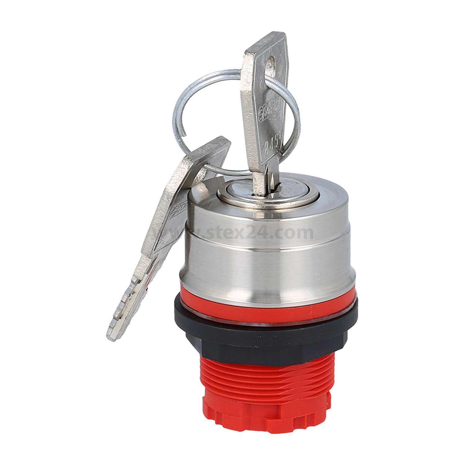 „Ein Metallschlüssel, der in einen roten und silbernen Schlossschalter eingeführt wird, mit einem sichtbaren Schlüsselring darüber.