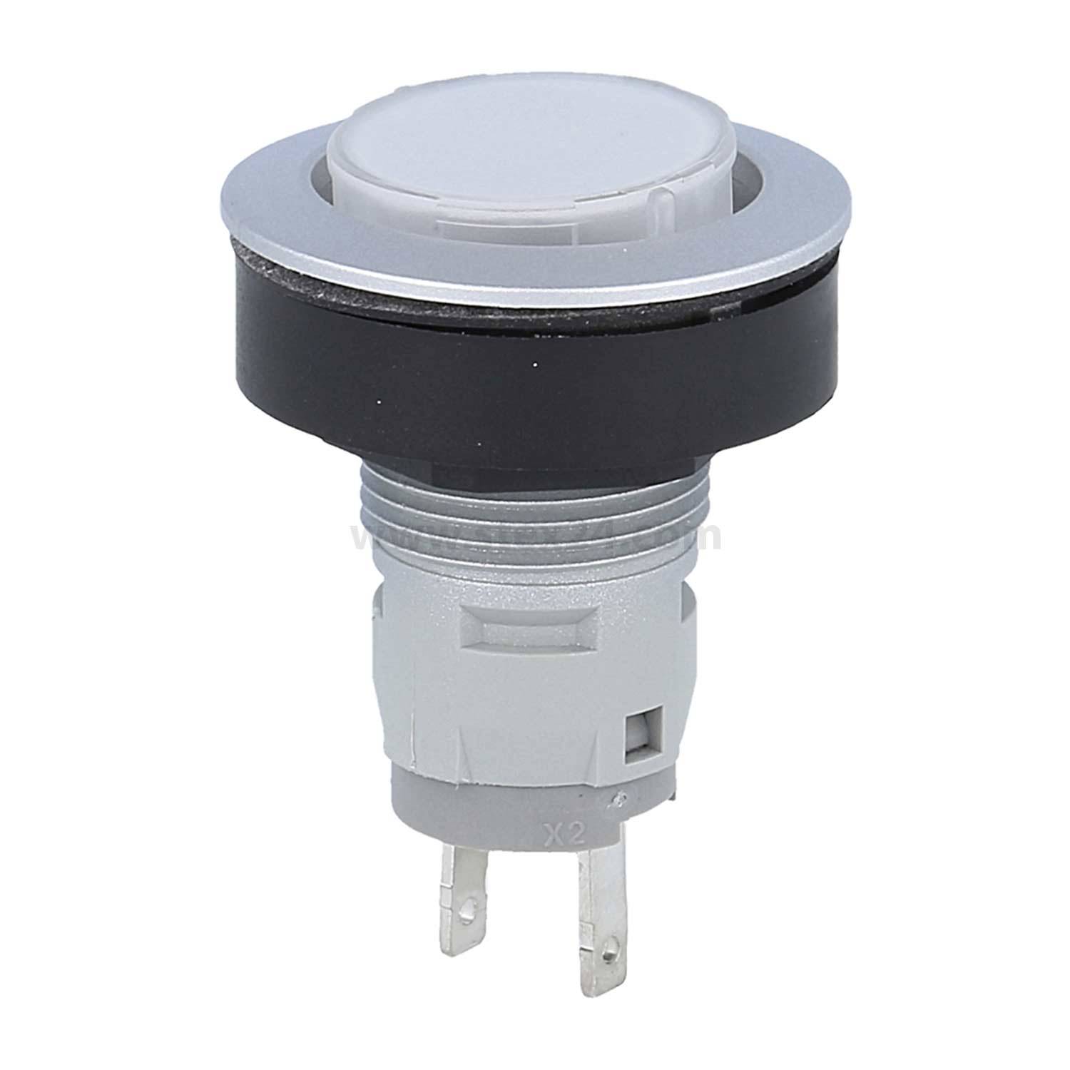 Ein grauer Drucktaster mit einer kreisförmigen Oberfläche und zwei Metallstiften an der Basis.