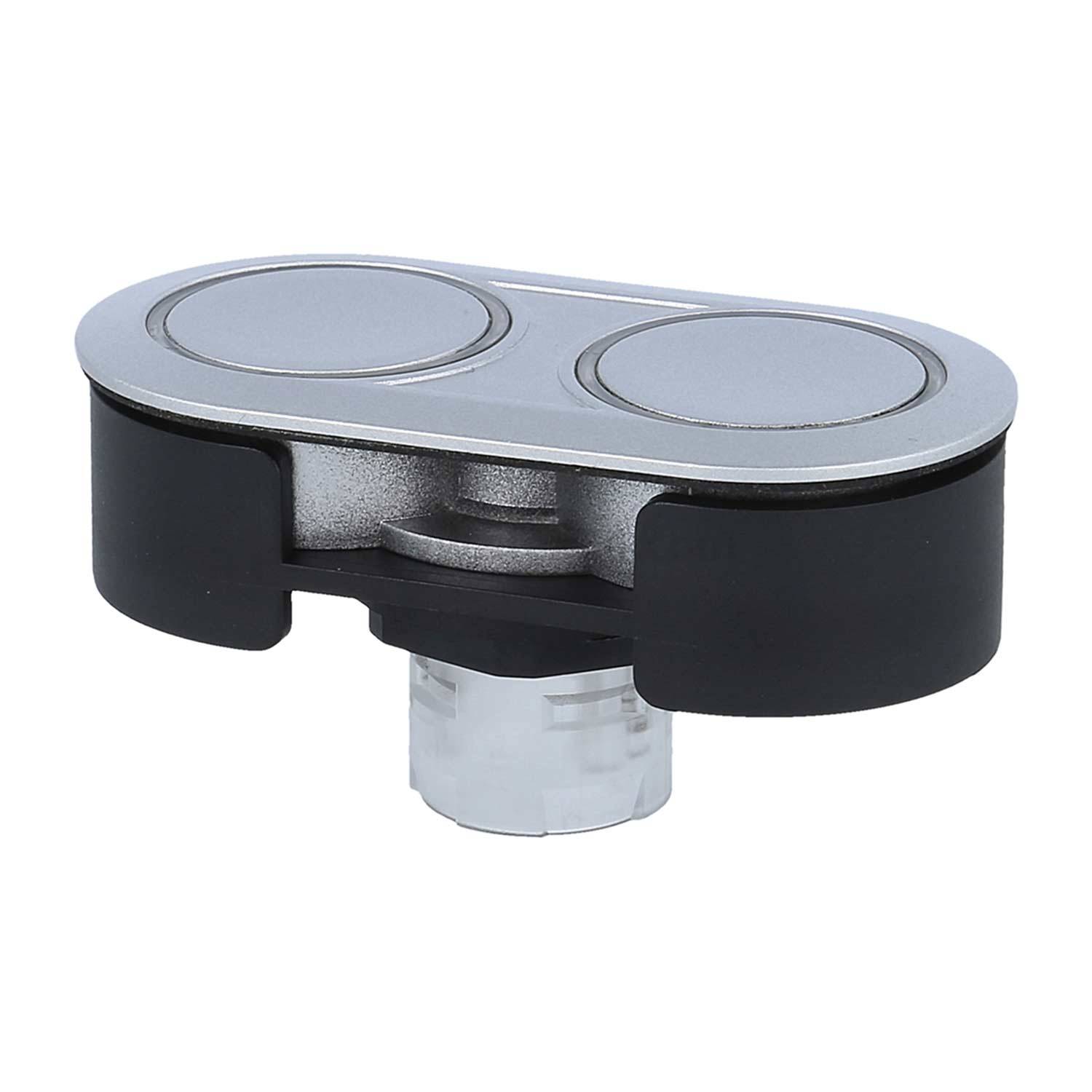 Ein schwarz-silberner mechanischer Apparat mit zwei kreisförmigen Komponenten an der Oberseite, möglicherweise eine Anschluss- oder Verbindungsvorrichtung, der vor einem einfarbigen Hintergrund abgebildet ist.