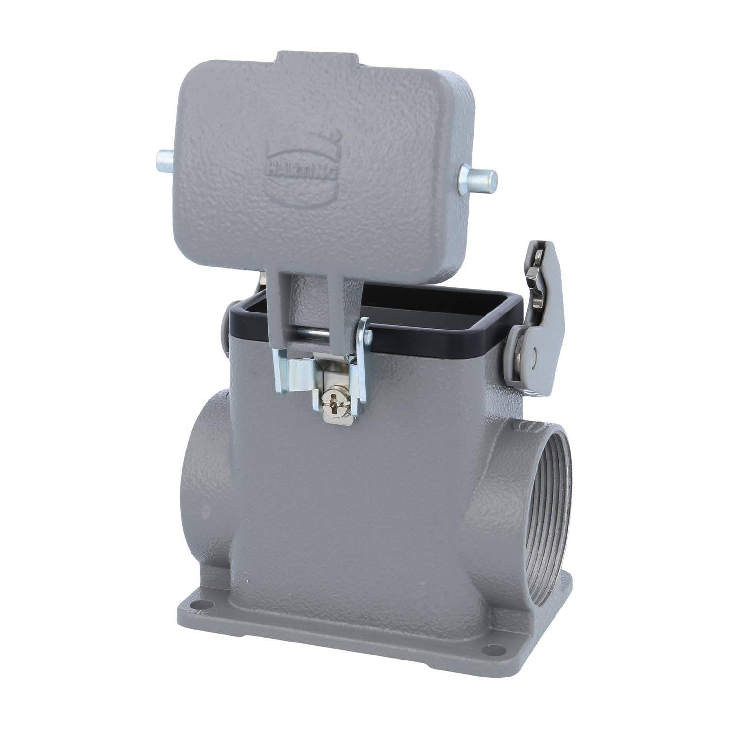 Industrieller grauer Metallverbinder mit klappbarem Schutzdeckel, geöffnet, um den Innenraum freizugeben, verwendet für elektrische Kabelverbindungen.