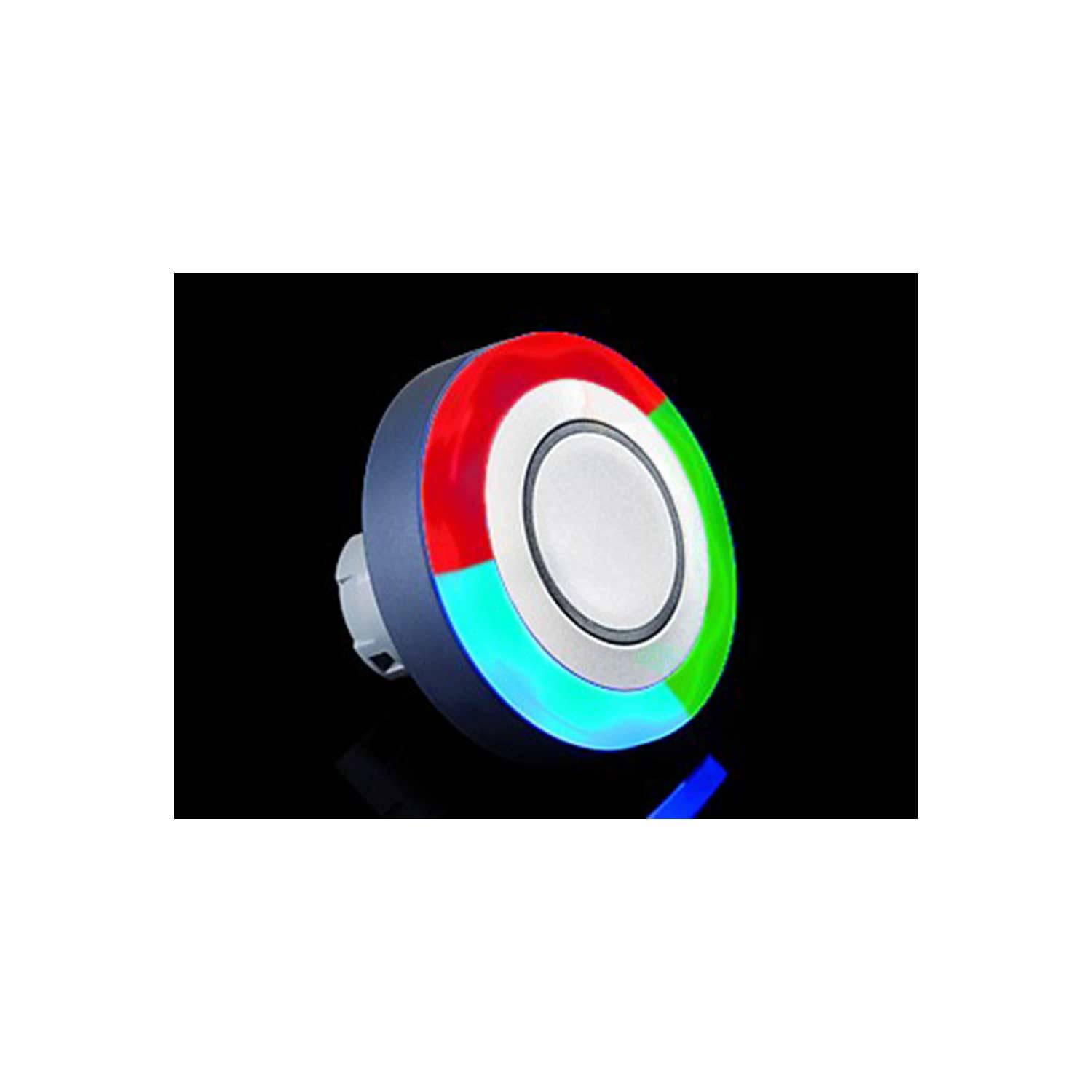 Eine kreisförmige LED-Taste mit rot, blau und grün beleuchteten Abschnitten, auf einem schwarzen Hintergrund montiert, zur Verwendung in Elektronik oder Geräten.