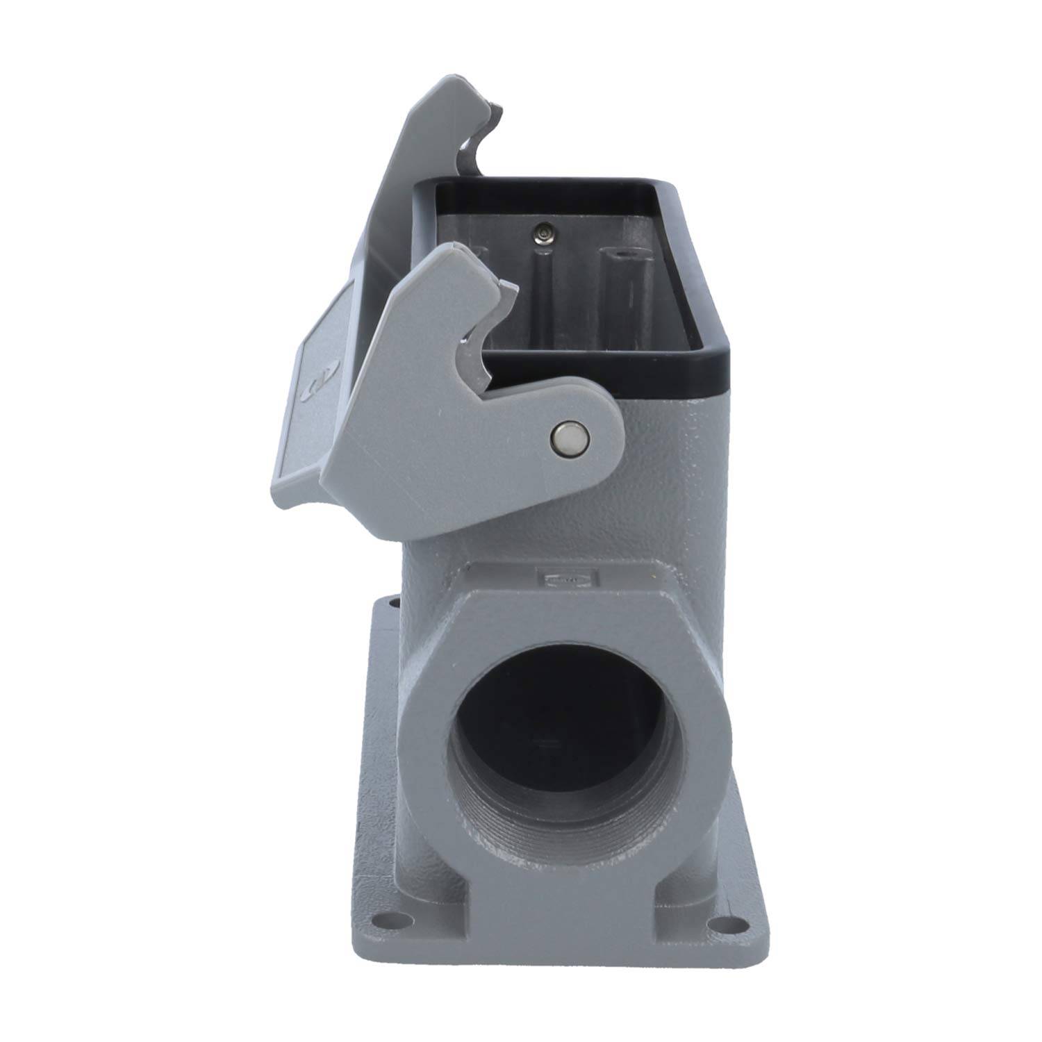 Eine rechteckige graue mechanische Komponente mit einer hervorstehenden Düse und klappbaren Schutzblenden oben, wahrscheinlich Teil eines industriellen Systems.