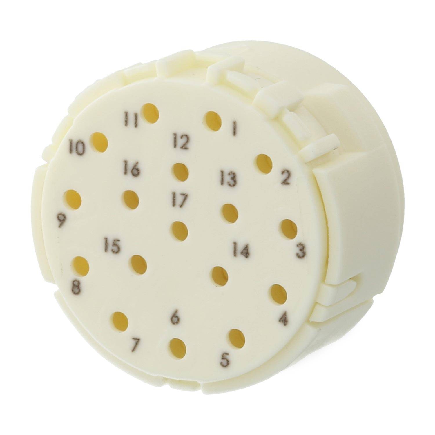 Ein kreisförmiger, elfenbeinfarbener Gegenstand mit nummerierten Löchern, die in einem Muster angeordnet sind. Die Zahlen reichen von 1 bis 17 und deuten auf ein Muster oder eine Abfolge hin.