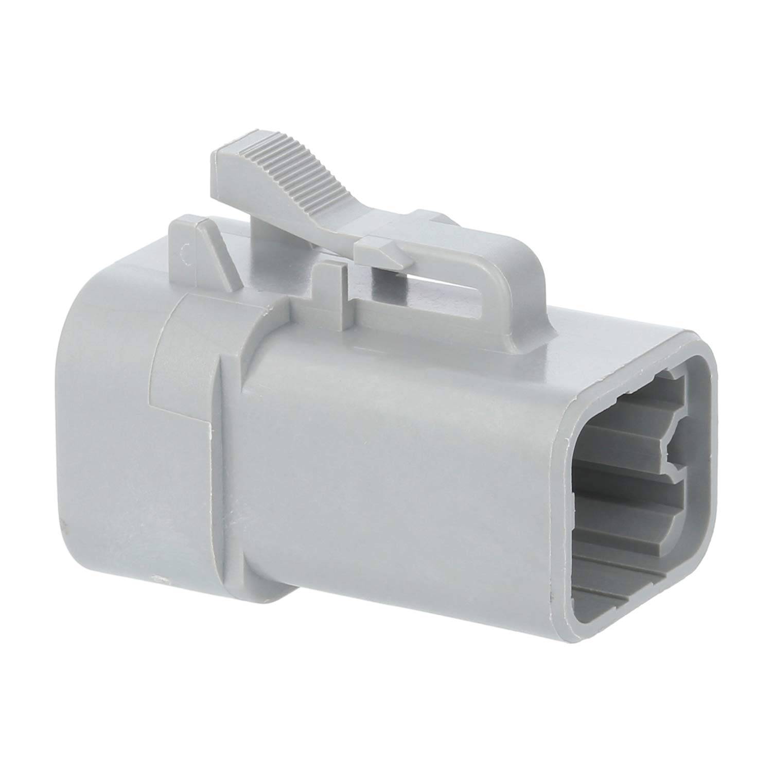 Ein grauer Kunststoff-Elektroverbinder mit einem Verschluss, der eine rechteckige Form und mehrere Schlitze zum Einfügen von Kabeln aufweist.