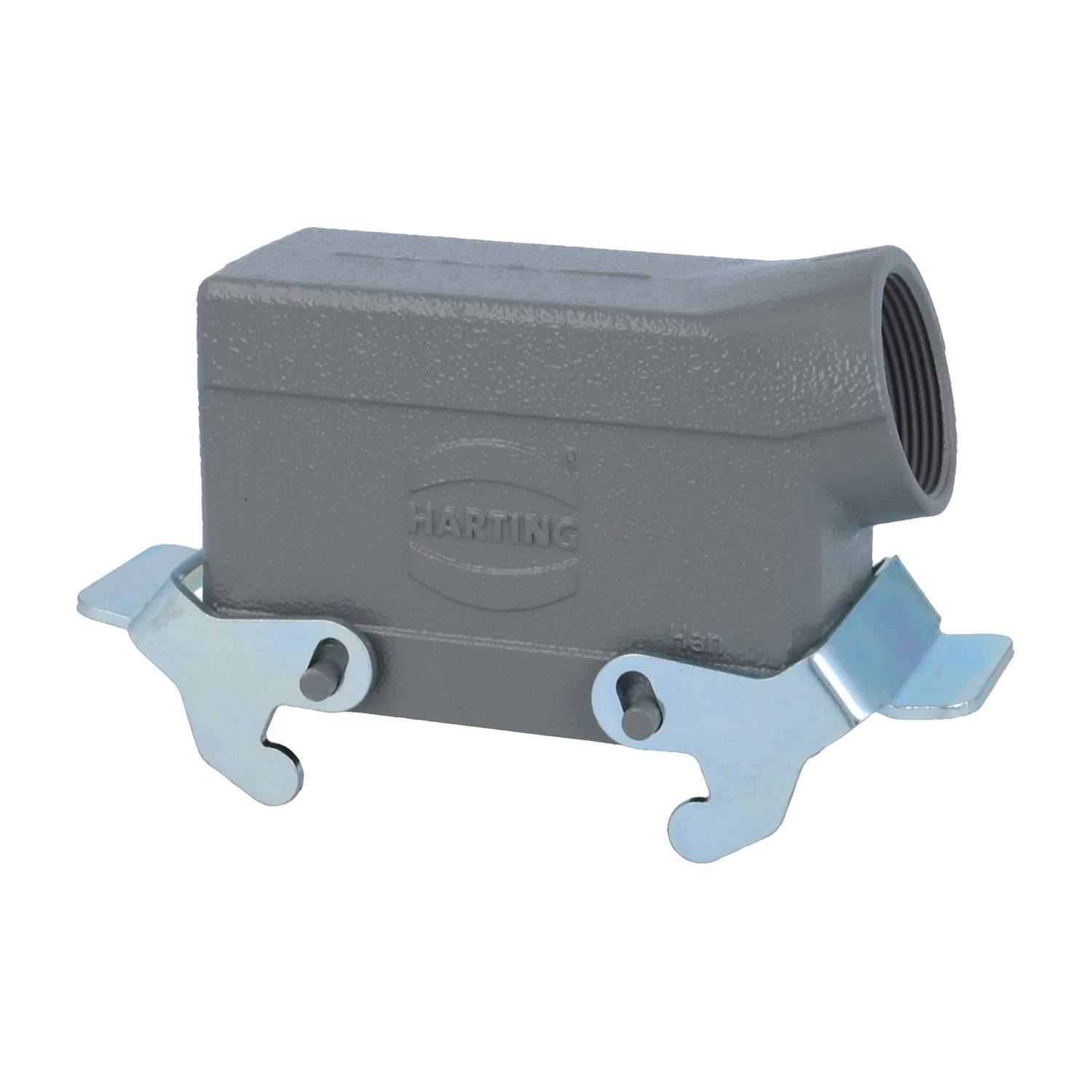 Rechteckiges Metallgehäuse für industrielle Verbindungsstecker mit seitlichem Kabeleintritt, mit 'HARTING'-Markierung. Zwei Metallverriegelungen an den Seiten.
