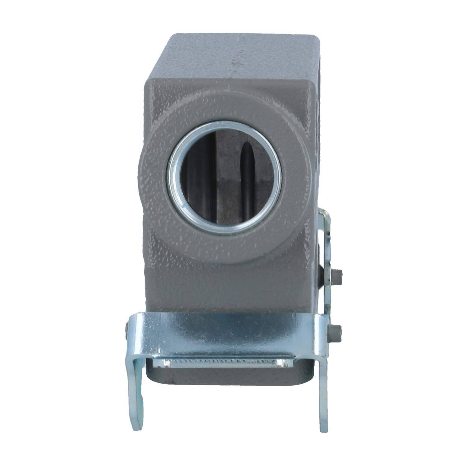 Ein grauer Metallblock mit einer kreisförmigen Nut in der Mitte, der an der Basis an einer silbernen Metallhalterung befestigt ist.