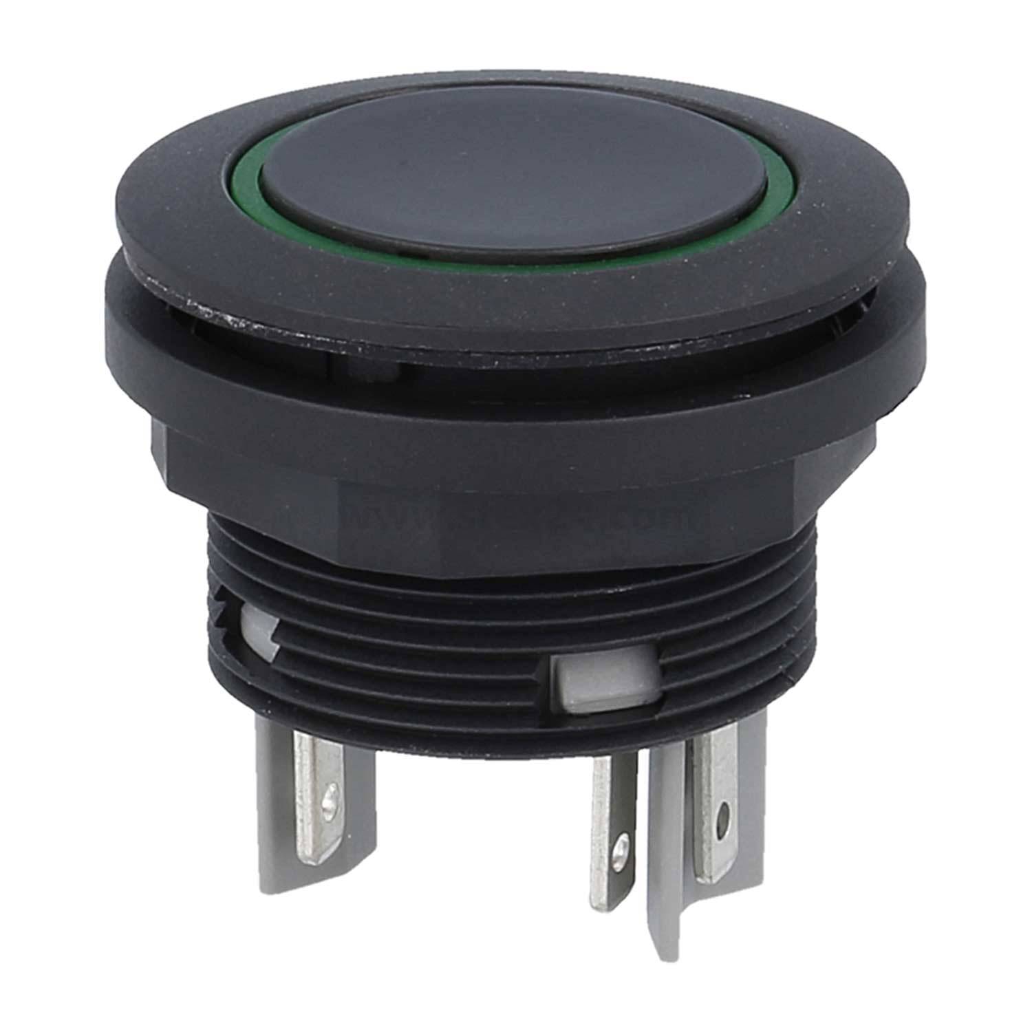 Ein schwarzer runder Drucktaster mit grünem Ringumriss, versehen mit drei Metallstiften an der Unterseite.