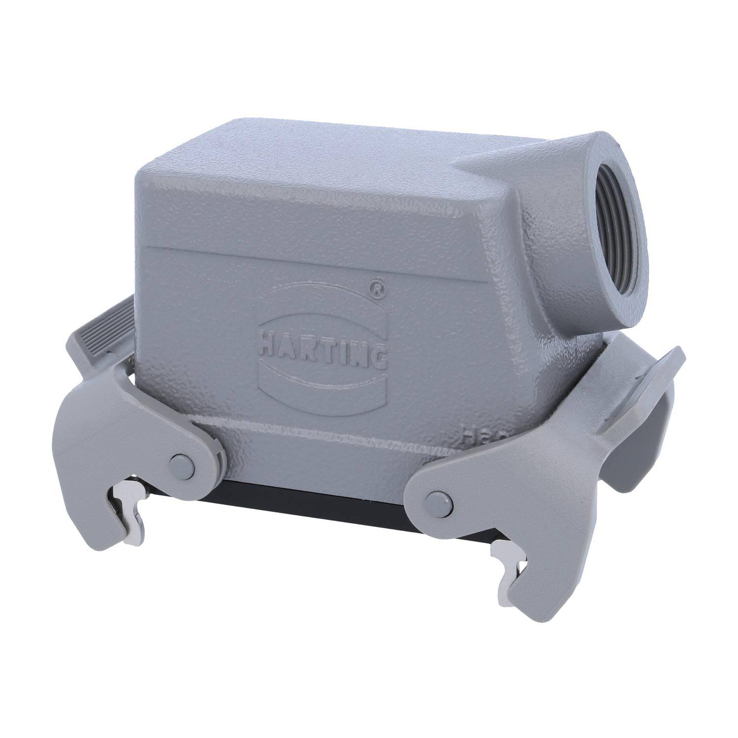 Ein graues industrielles Anschlussgehäuse mit seitlichen Verriegelungen, gekennzeichnet mit 'HARTING', verwendet für elektrische Verbindungen in Automatisierungsanwendungen.