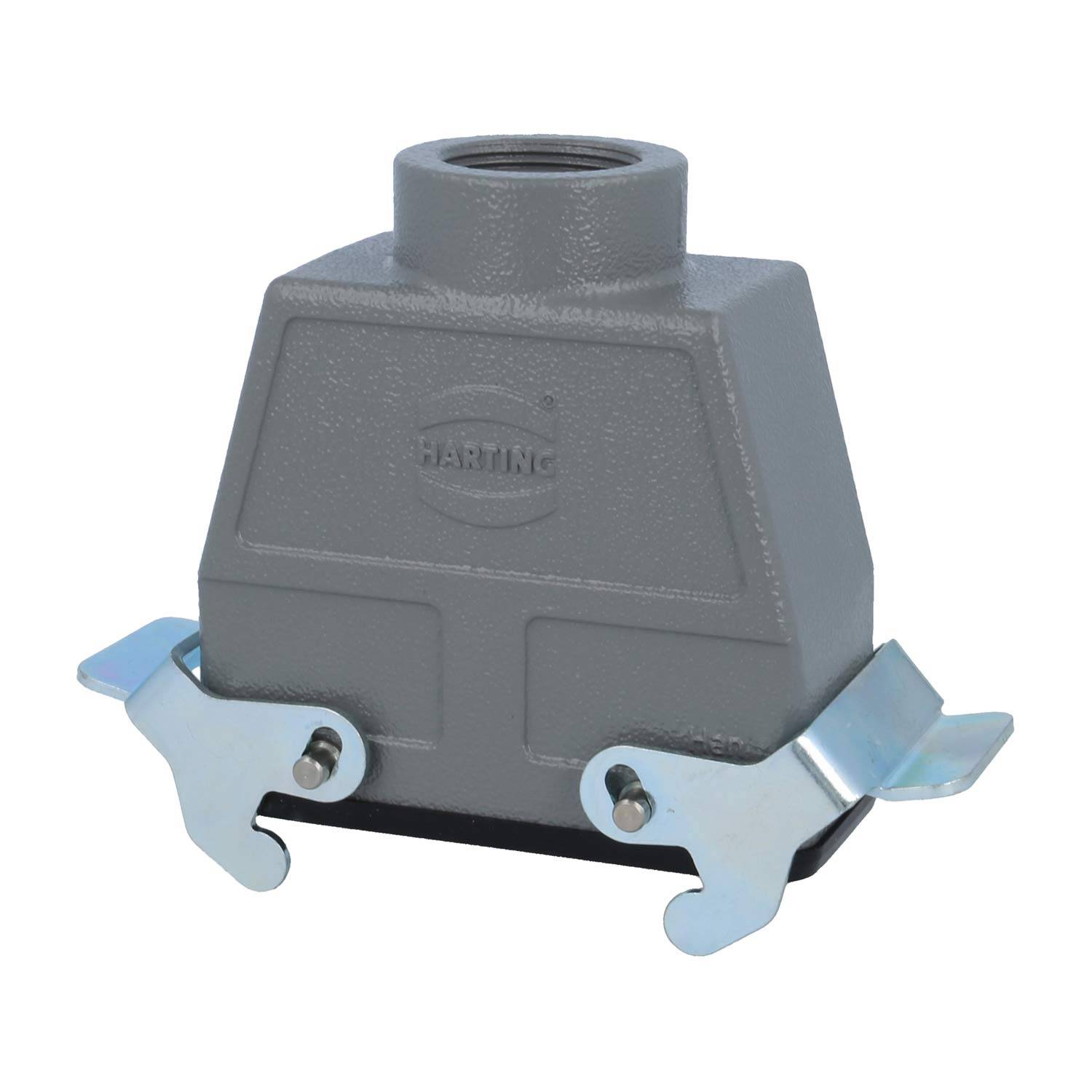 Ein graues industrielles Verbindungsgehäuse mit einem verschraubten Deckel und Metalllaschen an den Seiten, mit dem auf der Vorderseite geprägten 'HARTING' Logo.