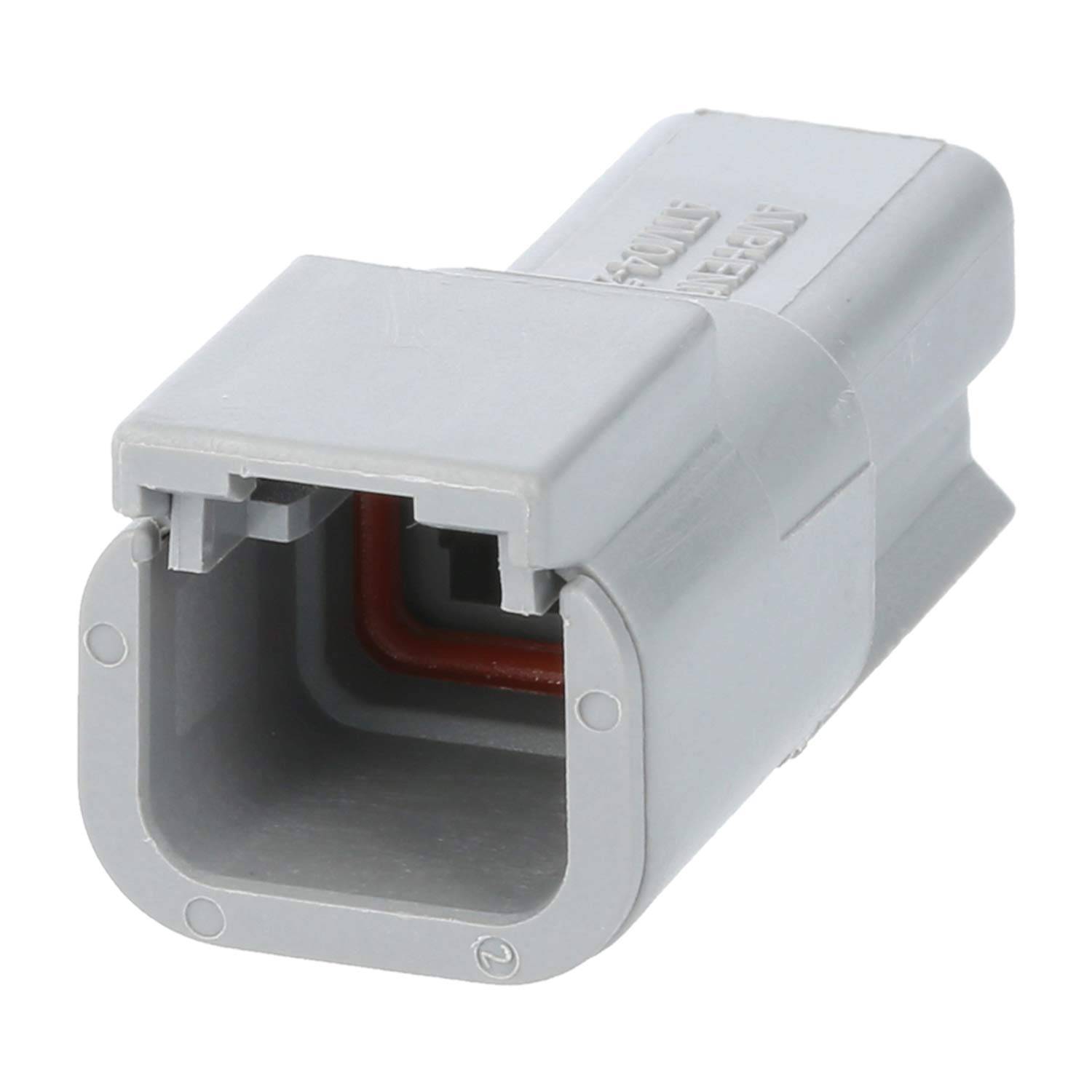 Eine Nahaufnahme eines grauen elektrischen Verbinders mit rechteckiger Form und sichtbaren Metallkontakten im Inneren, der für automotive Verkabelung verwendet wird.