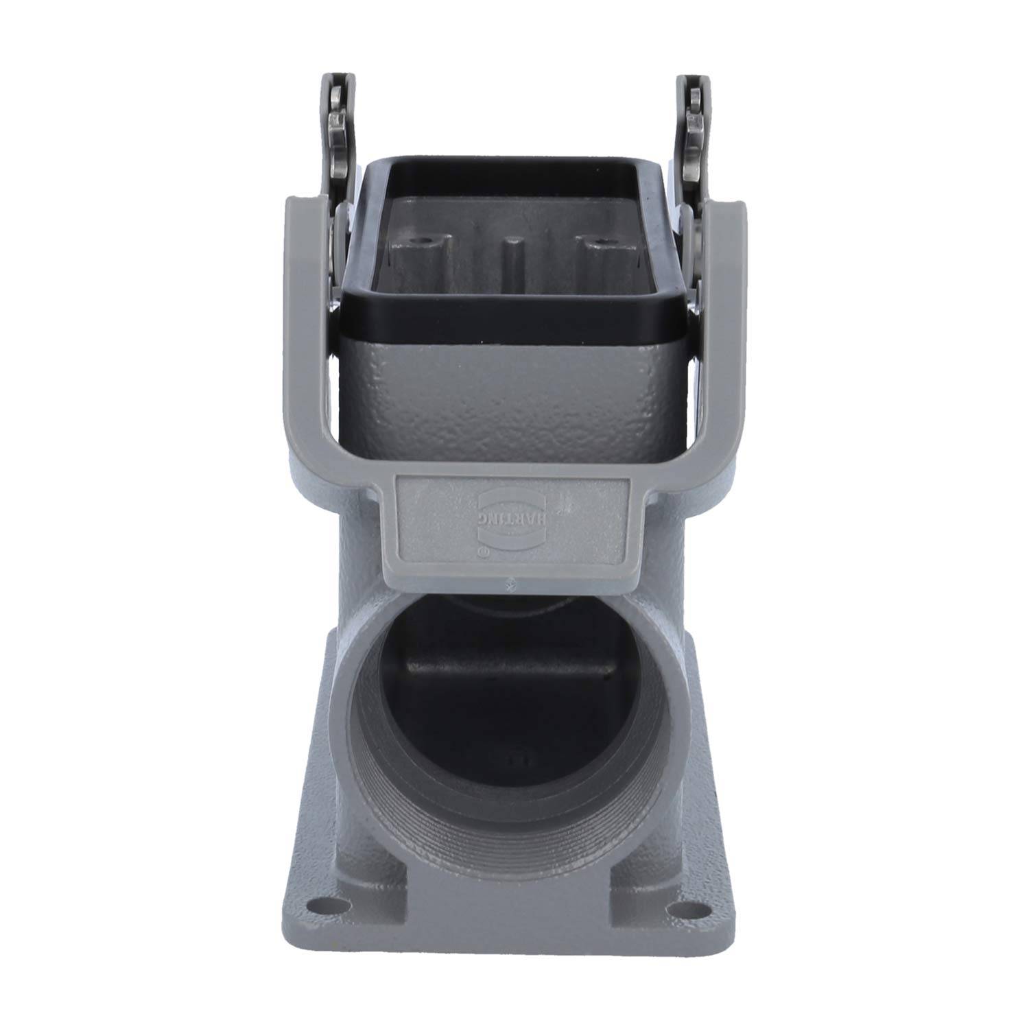 Ein robustes industrielles elektrisches Anschlussgehäuse, grau, mit rechteckiger Oberseite und Öffnung, angebracht an einer zylindrischen Basis mit Montageflansche.