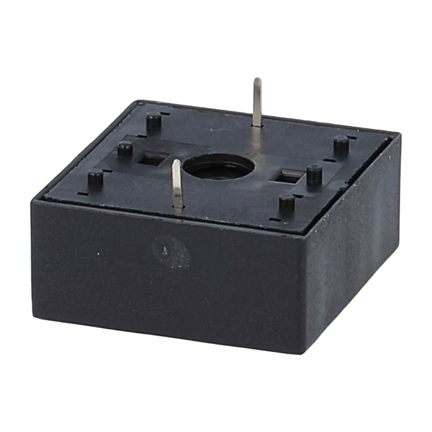 Eine schwarze, rechteckige elektronische Komponente mit nach oben ragenden Metallstiften, wahrscheinlich als Diodenbrücke für elektrische Schaltkreise verwendet.